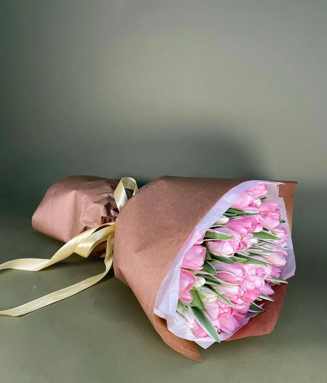 #101 Light Pink Tulips  - A bouquet of delicate pink tulips in craft paper is a stylish composition that gives an atmosphere of spring freshness and comfort. Perfect for simple but exquisite moments.