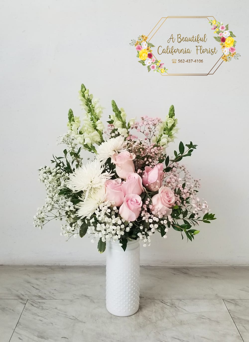 Lady Diana - Beautiful pink roses and white Fuji spider mums, fresh snapdragons, delicate clouds of white and pink babies breath, all accented by lush greens. Designed by our artisan florist in white vase. Hand delivered by our professional driver. Lady Diana from A Beautiful California Florist, Long Beach California, offering same day flower order and delivery service. Aproximate size: 28&quot; T x 20&quot; W