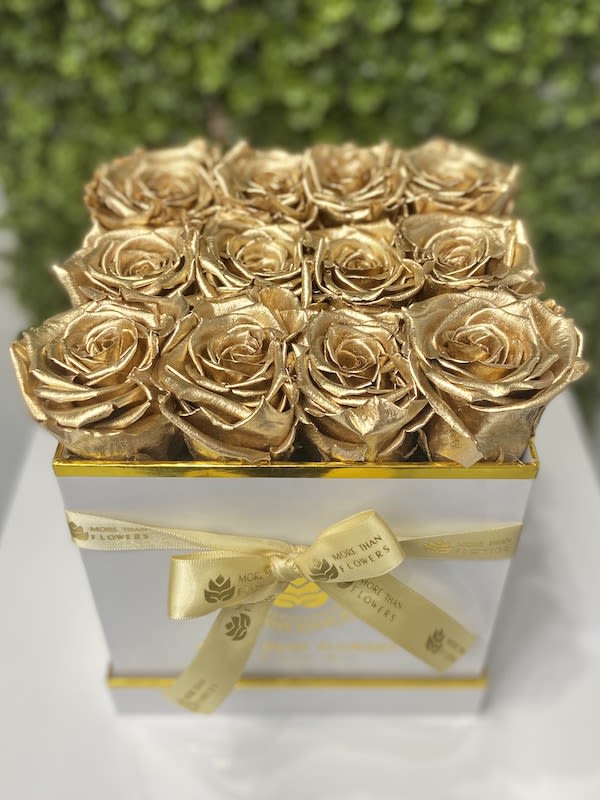 Eternal Roses Square Box - White Box, Gold - Eternal Roses Square Box: We stopped the clock for our preserved roses to experience our Eternal Deluxe Collection timelessly. 12 preserved roses decorated in our signature deluxe square boxes and completed with a bow and a personalized card message, trendy and fancy. Roses that Last 3 years. *Avoid direct sunlight, dust, water or excessive heat. *Available for Nationwide Shipping (5-7 days shipping time)