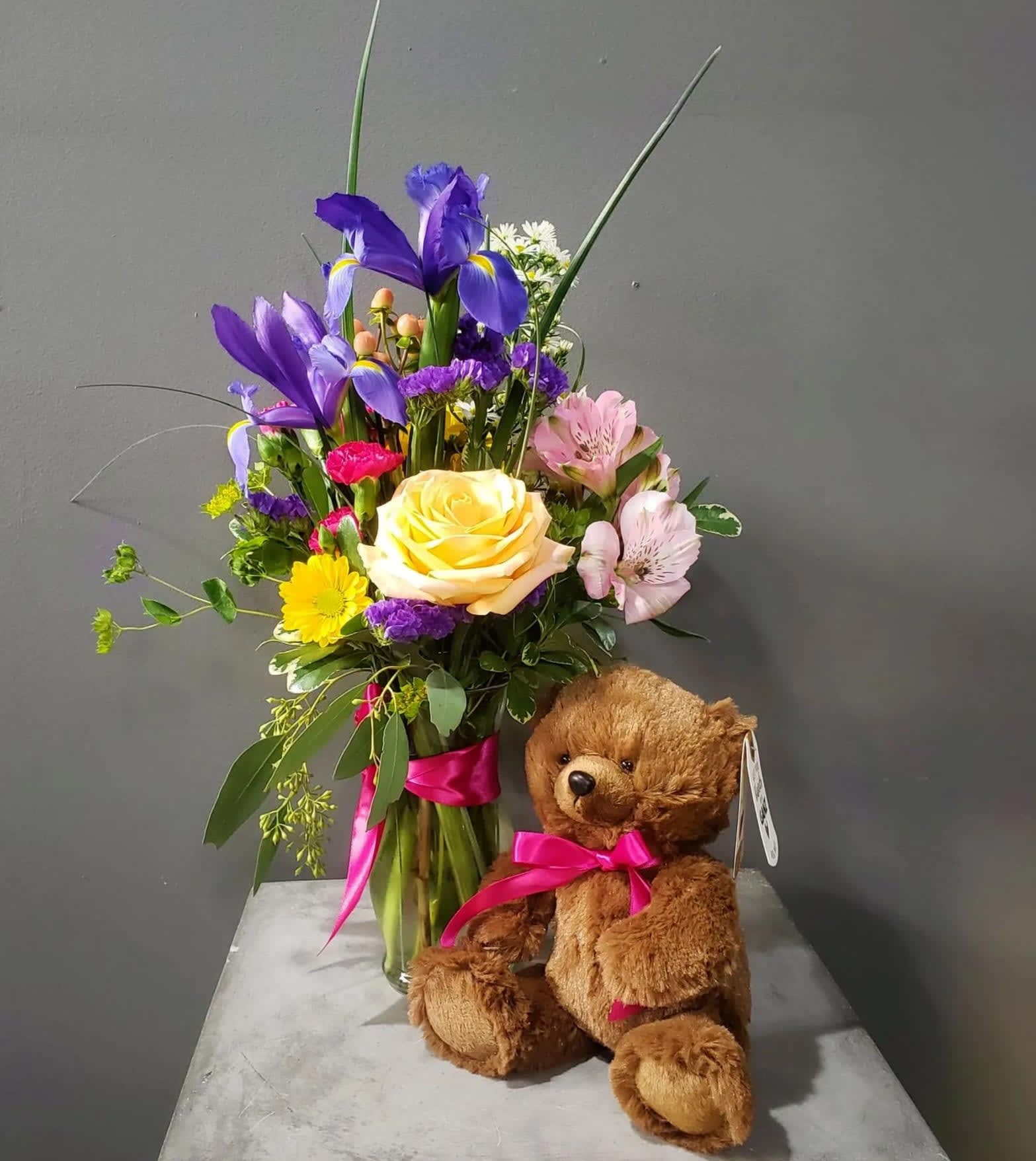 I Can't Bear Without You I Can't Bear Without You - A bright arrangement paired with a cute soft teddy bear! Let your special someone know that you can't bear without them! We have brown, tan and white teddy bears! Please let us know if you have a specific color request!