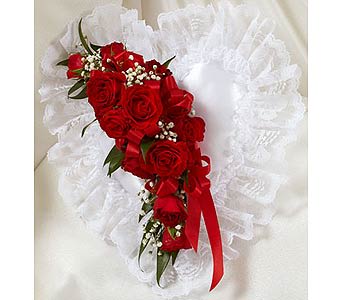 Red and White Satin Heart Casket Pillow Red and White Satin Heart Casket Pillow - Red and White Satin Heart Casket Pillow is adorned with spray roses and baby's breath. As Shown : HUD-91252