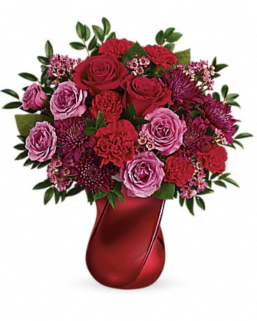Mad Crush Bouquet Mad Crush Bouquet - Spoil your crush with a luxurious red and lavender bouquet arranged in a stunning crimson ceramic vase with modern twisted design. Vase used upon availability in our shop.