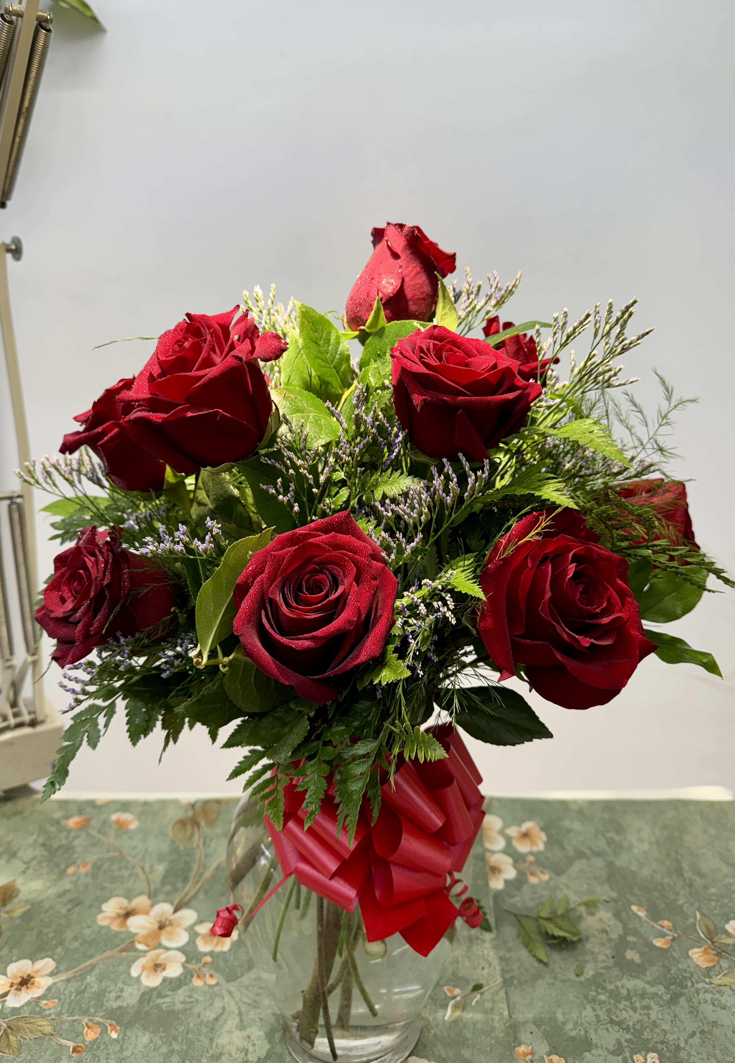 CLASSIC LOVE IN A VASE  ( 12 Roses.) - The classic will always be the best.  Dozen Red Roses in Designer Quality. Rose color can be changed to Pink, White, Yellow etc. Roses. Greenery. Vase 