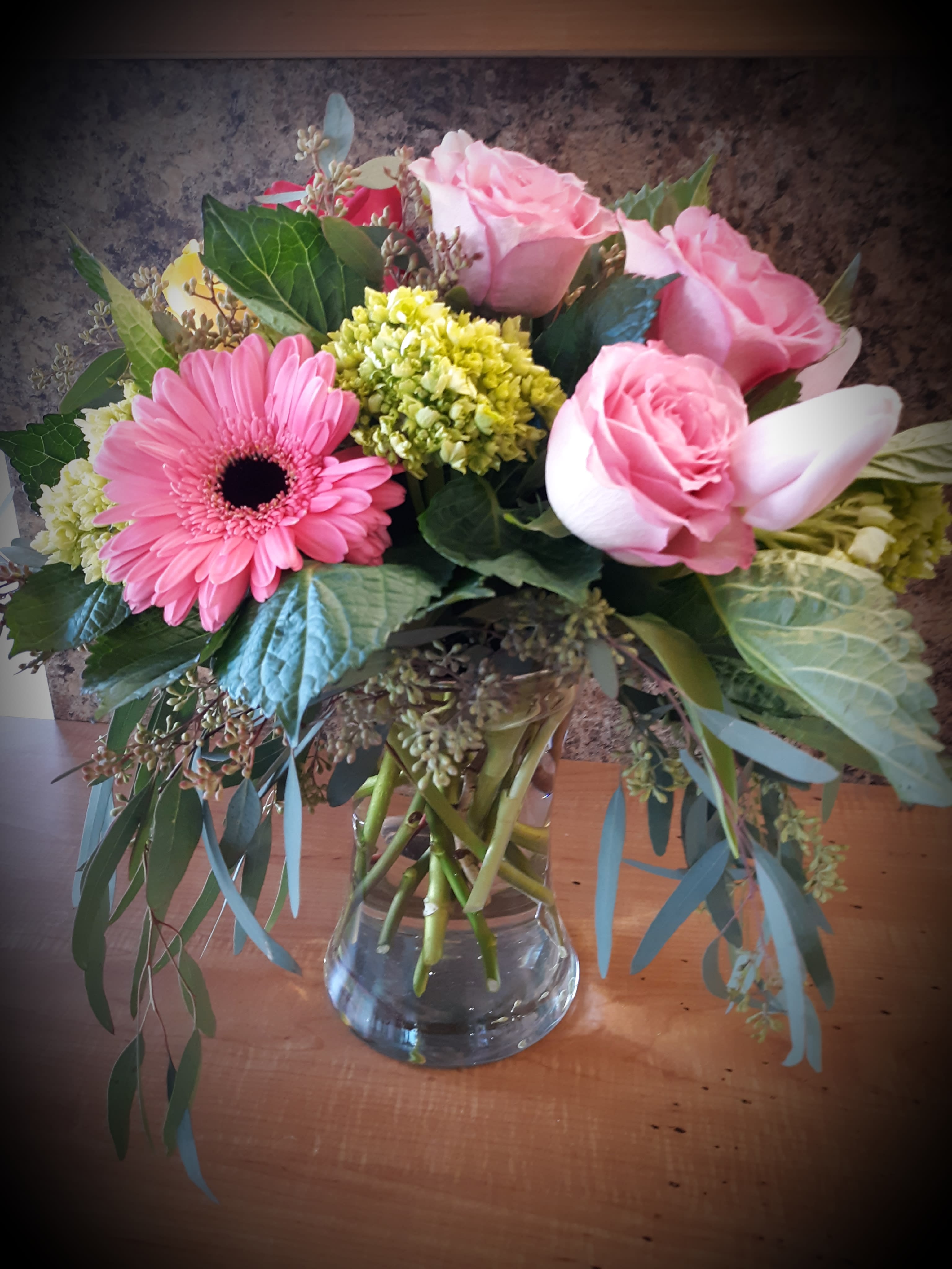 pink passion - These soft pink roses, tulips and gerberas pair perfectly with pale green hydrangeas and seeded eucalyptus in a simply elegant bouquet 