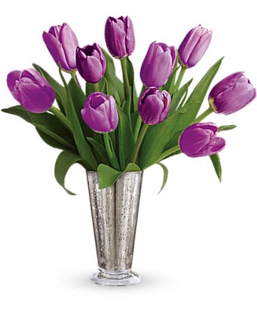 Tantalizing Tulips Bouquet Tantalizing Tulips Bouquet - Vintage romance. Yesterday today tomorrow - your love is as timeless as these long-stemmed purple tulips arranged in a shimmering mercury glass vase. Vase used upon availability in our shop.