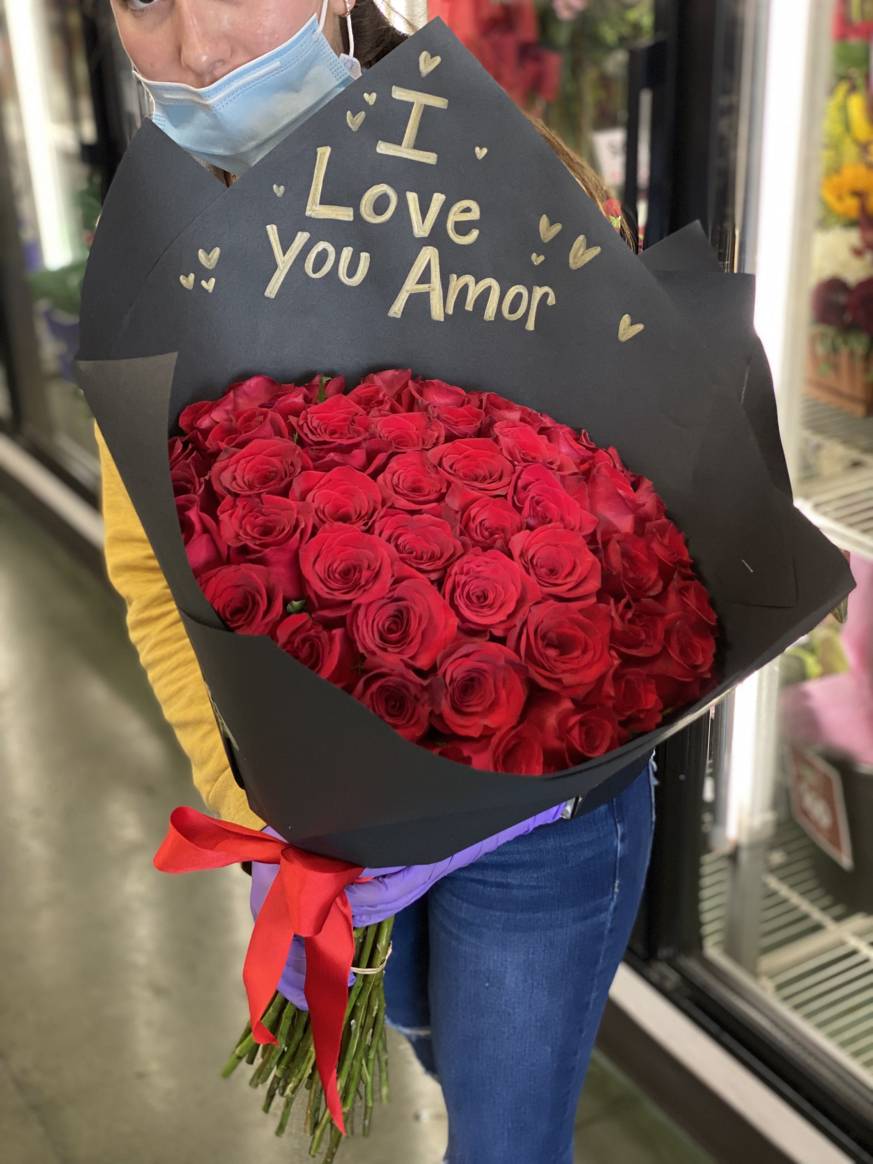 4 Dozen Pure Roses Wrapped 4 Dozen Pure Roses Wrapped - WRITING INCLUDED. ADD your custom special message during checkout. Paper can come in Black, Brown, or Floral White. Rose Color can change as well.