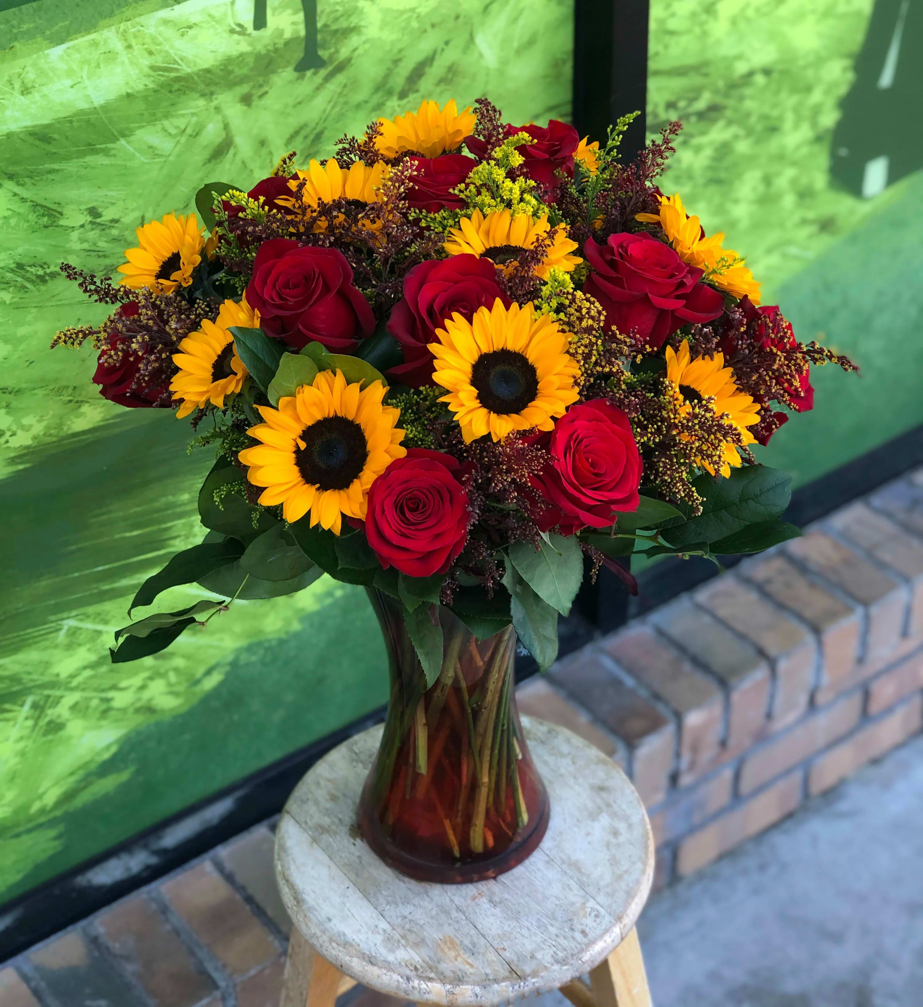 Love Me More - A happy and loving arrangement for the special person in your life   Approximate size: 26&quot; High and 23&quot; Wide