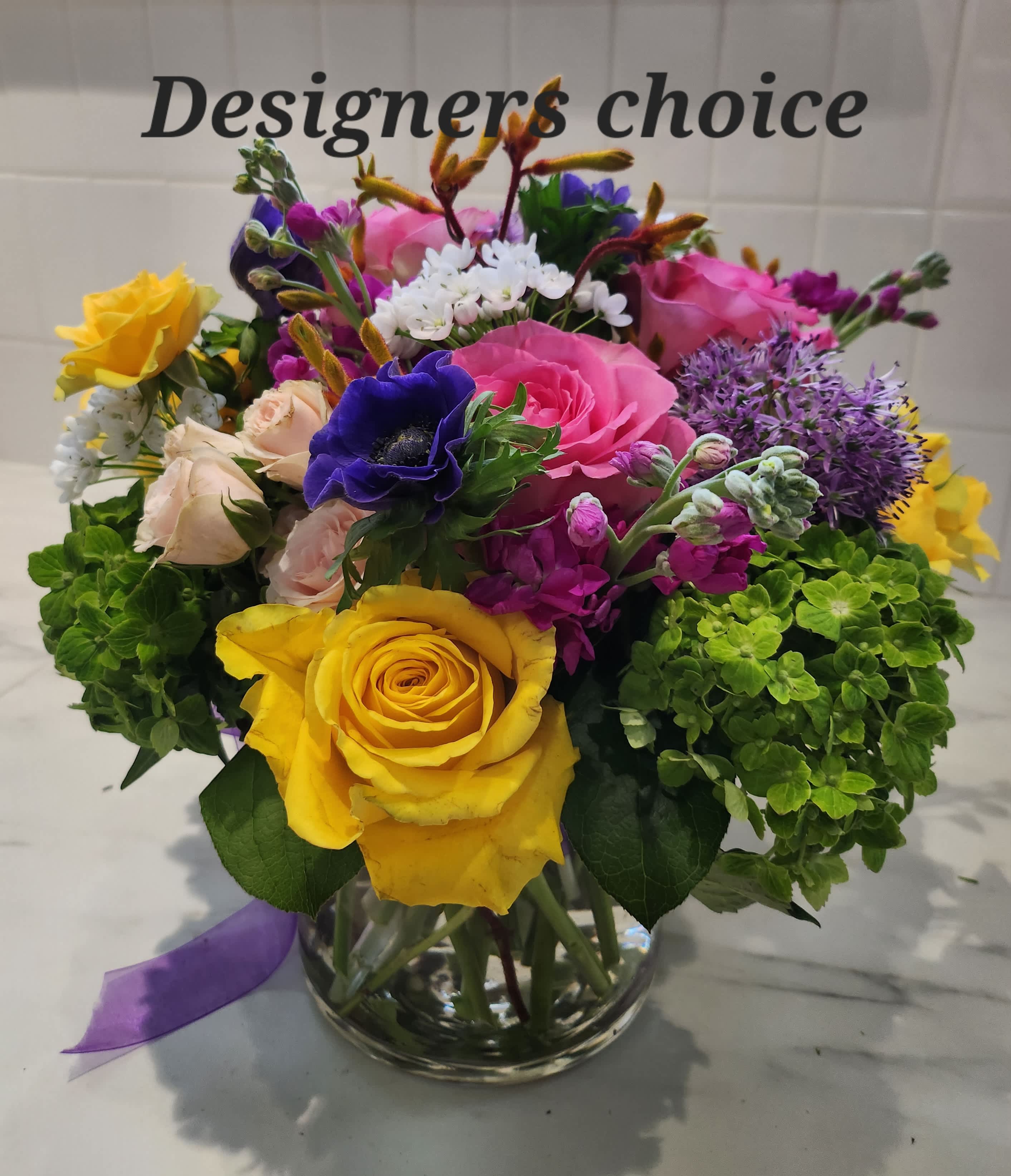Designer's Choice Designer's Choice - Designer's Choice - using the best available flowers. We have peonies, lilacs, lilies, roses and many others. We promise you our finest work!