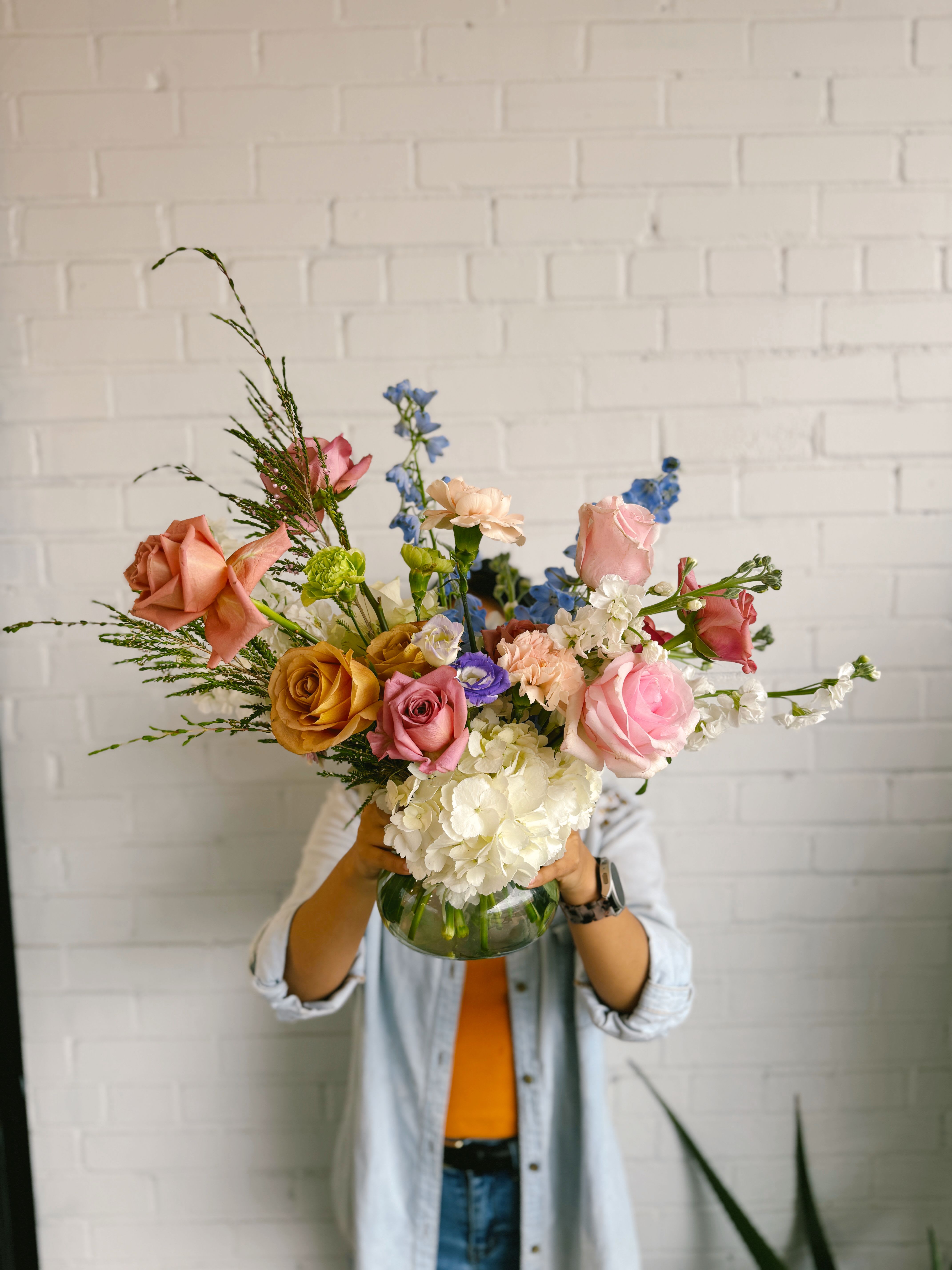 Marry  - This arrangement is uniquely crafted with bright and fresh florals. Arrangement and vase may vary depending on product availability.