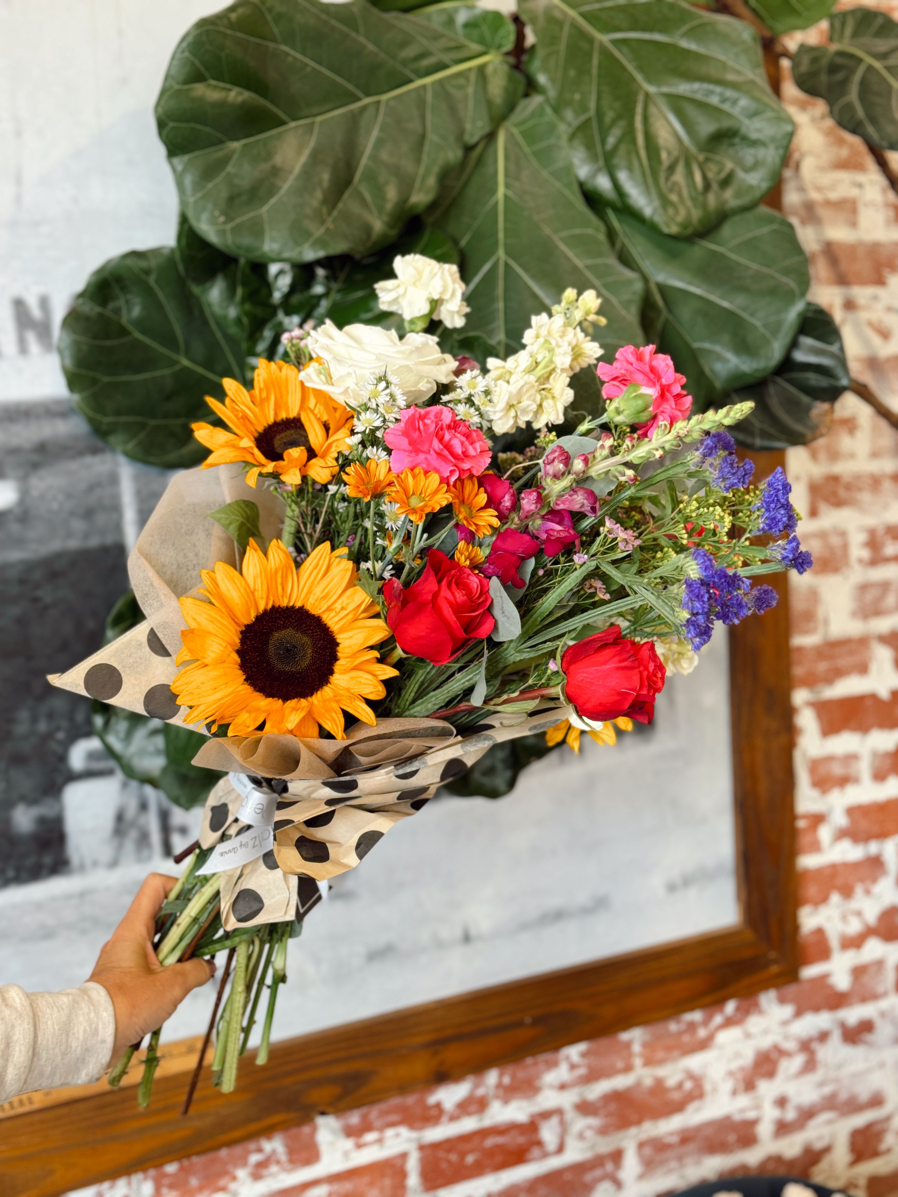 Sunny Day  - This arrangement is uniquely crafted with bright and fresh florals. Arrangement and vase may vary depending on product availability.