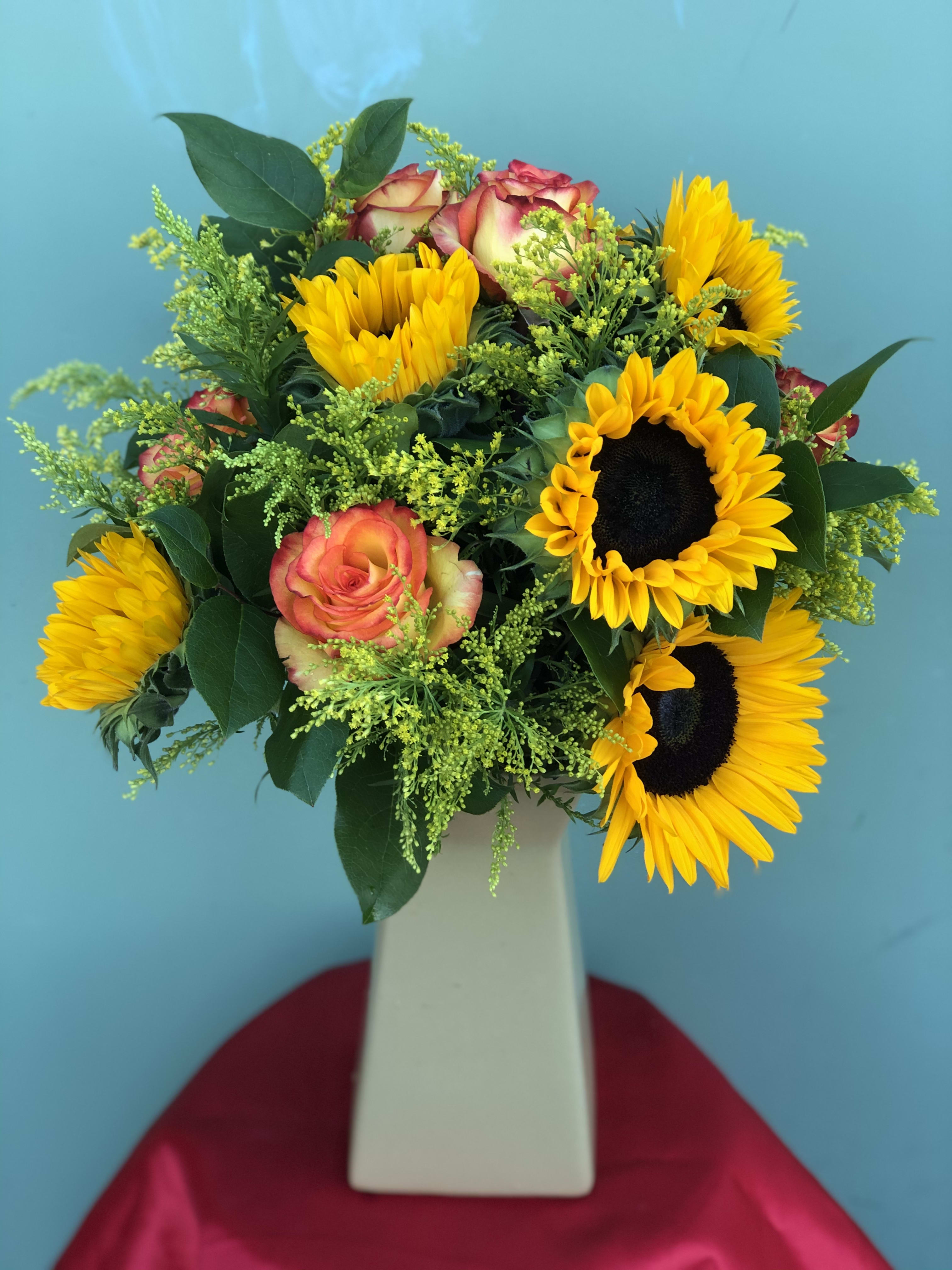 Sunflower Delight - Sunflowers, Roses, and filler blend with one another to bring this arrangement to life