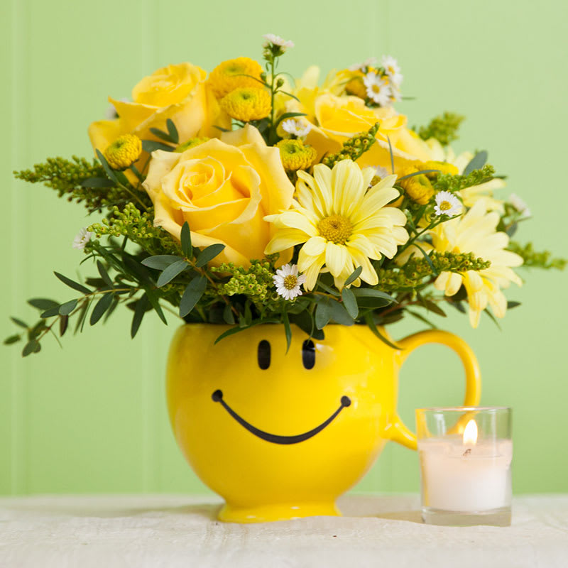 Dont Worry Be Happy  - Yellow Roses ,Daisys,Solidago and accent Flowers arranged in A Smile Face Mug
