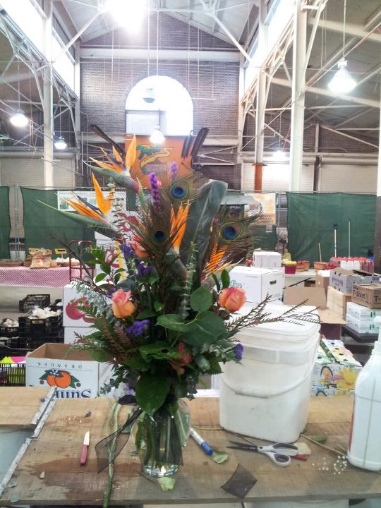 2 Birds in 1 vase. 2 Birds in 1 vase. - Birds-Of-Paradise and Peacock feathers, made every Saturday at Detroit's Eastern Market.
