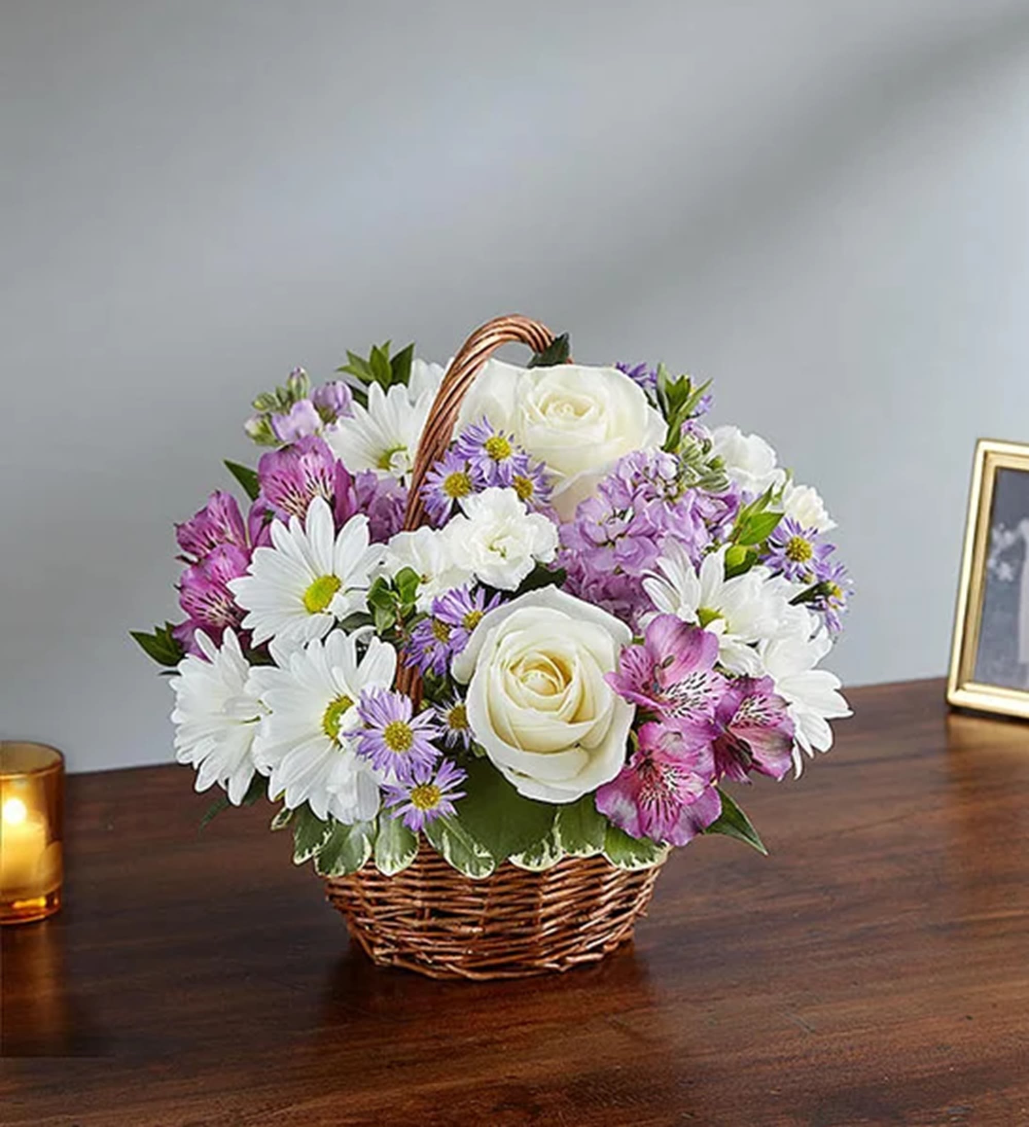 Peace, Prayers &amp; Blessings Lavender &amp; White - Just as lavender is said to hold a sacred place in nature, the departed will always hold a sacred place in your heart. This lavender &amp; white arrangement, artistically designed inside a basket, is a touching way to convey your love &amp; sincerest blessings. Appropriate for the home of family members or friends, memorial reception, or other occasions.  DETAILS Lavender stock &amp; monte casino, purple alstroemeria &amp; white roses, daisy poms &amp; mini carnations; accented with greenery  VASE INCLUDED Orientation: All-Around Item #NF-1328  FLORIST-TO-DOOR Same day flower delivery on most orders placed online by 12 pm or 10 am on weekends PST.  BLOOM DETAILS Roses Mini-Carnations Alstroemerias Stock Daisy-Mums Montecasino Greenery  The Standard Arrangement is approx. 10&quot;H x 10&quot;W The Deluxe Arrangement is approx. 11&quot;H x 11&quot;W The Premium Arrangement is approx. 12&quot;H x 12&quot;W  How to place an order? 1. You can place an order directly on this secure website OR 2. You can call in your order by dialing: (323) 262 - 9238 OR 3. You can visit our store (appointment recommended 323.262.9238)  NINFA'S FLOWERS 2405 WHITTIER BLVD. LOS ANGELES, CA. 90023  ATTENTION: *Please note that on busy holidays, Valentine's Day, and Mother's Day, we cannot verify if the recipient received the flowers until the following day. You can verify delivery on the website after 10:00 pm, call 323.262.9238 the following day after 10:00 am, or contact the recipient directly. Thank you for your patience and understanding.