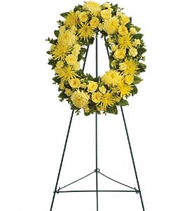 Eternal Sunshine *must be ordered 5 Days In Advance* Eternal Sunshine *must be ordered 5 Days In Advance* - ***Must Be 5 Days NOTICE*** This lovely medley of yellow flowers so beautifully arranged in a standing wreath is a reminder of the joy of life even during the darkest of times. It is an expression of hope that the family will deeply appreciate and long remember.