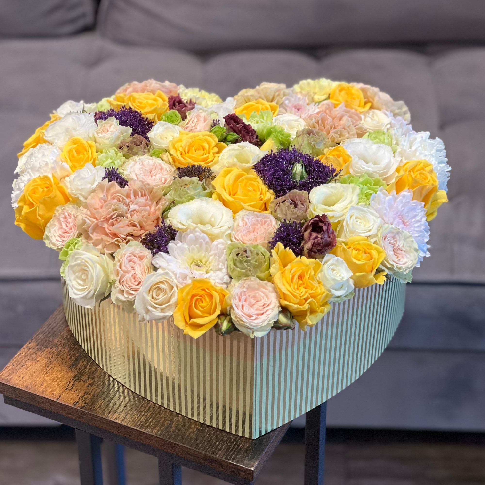 Golden Love Heart Box - Mixed flowers in a heart box. On the picture Premium size
