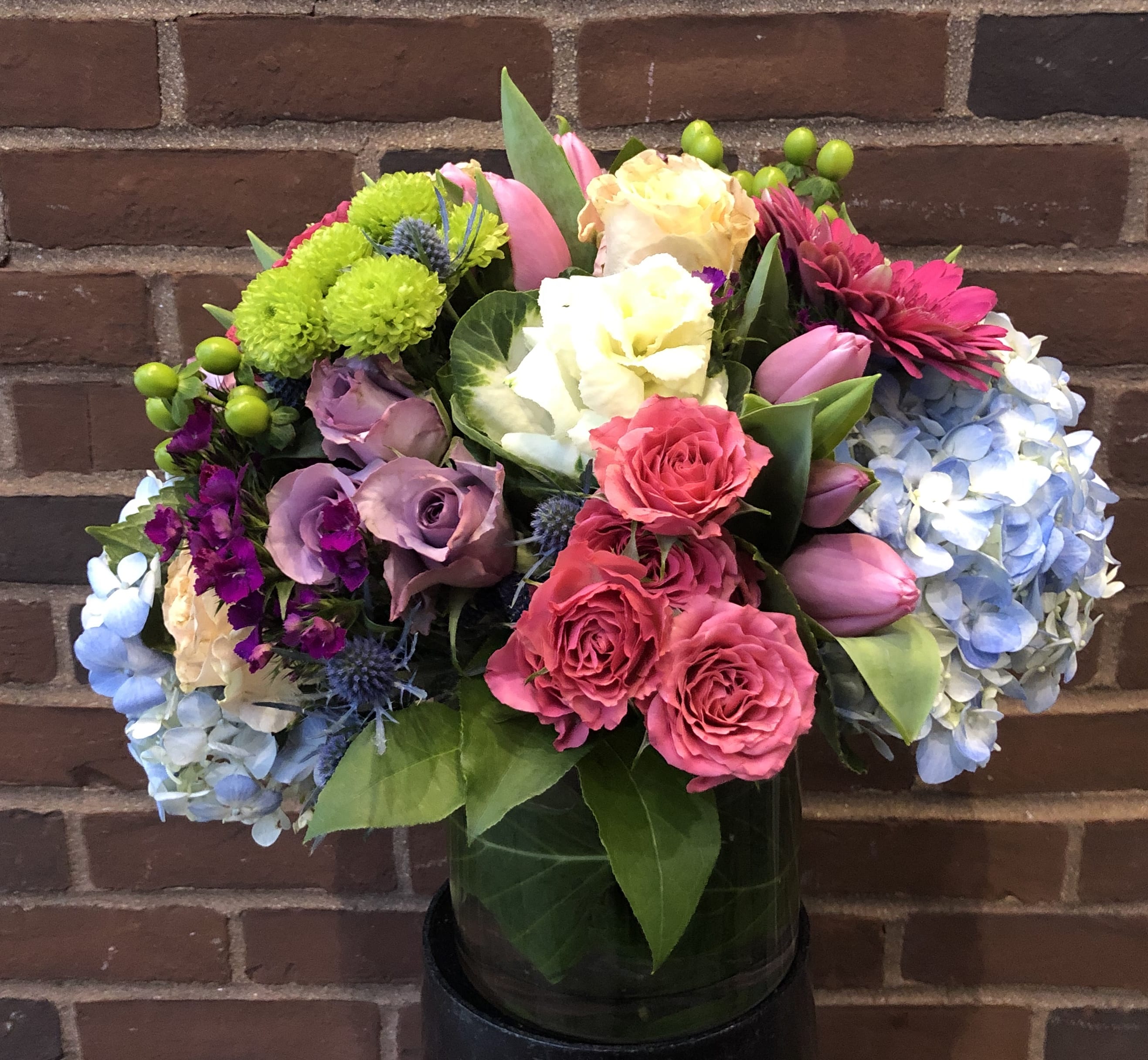 Extravagant Beauty Extravagant Beauty - What better way to say “you are being thought of”... An abundance of beautifully imported flowers from around the world. This arrangement has it all!