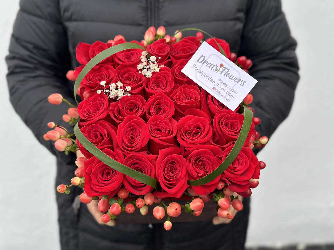 Love you more - 2 dozen roses arranged in a modern box perfect for SOMEONE YOU LOVE.
