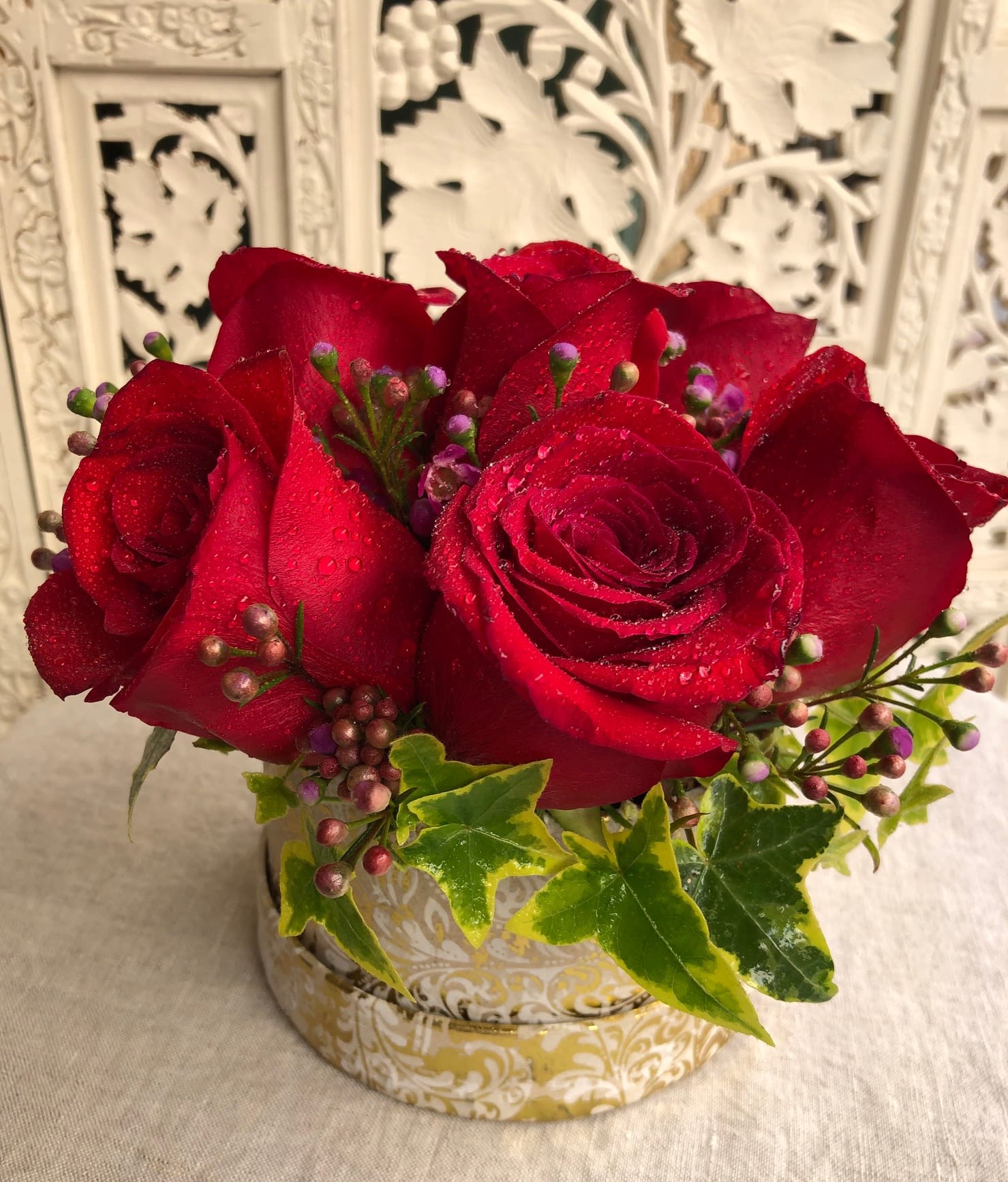 Mini Rose Box - Sweet &amp; simple rose arrangement in a gold and white box ~ the perfect size to present a half dozen premium roses. Accented with wax flowers and ivy. Please specify either red or pink roses.