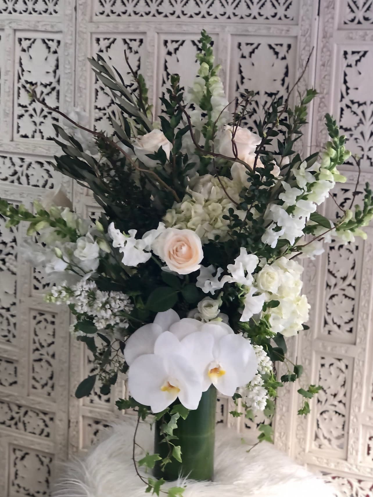 White Elegance - Gorgeous, tall arrangement with an assortment of white and cream garden flowers as well as a variety of foliage, textures and greens.