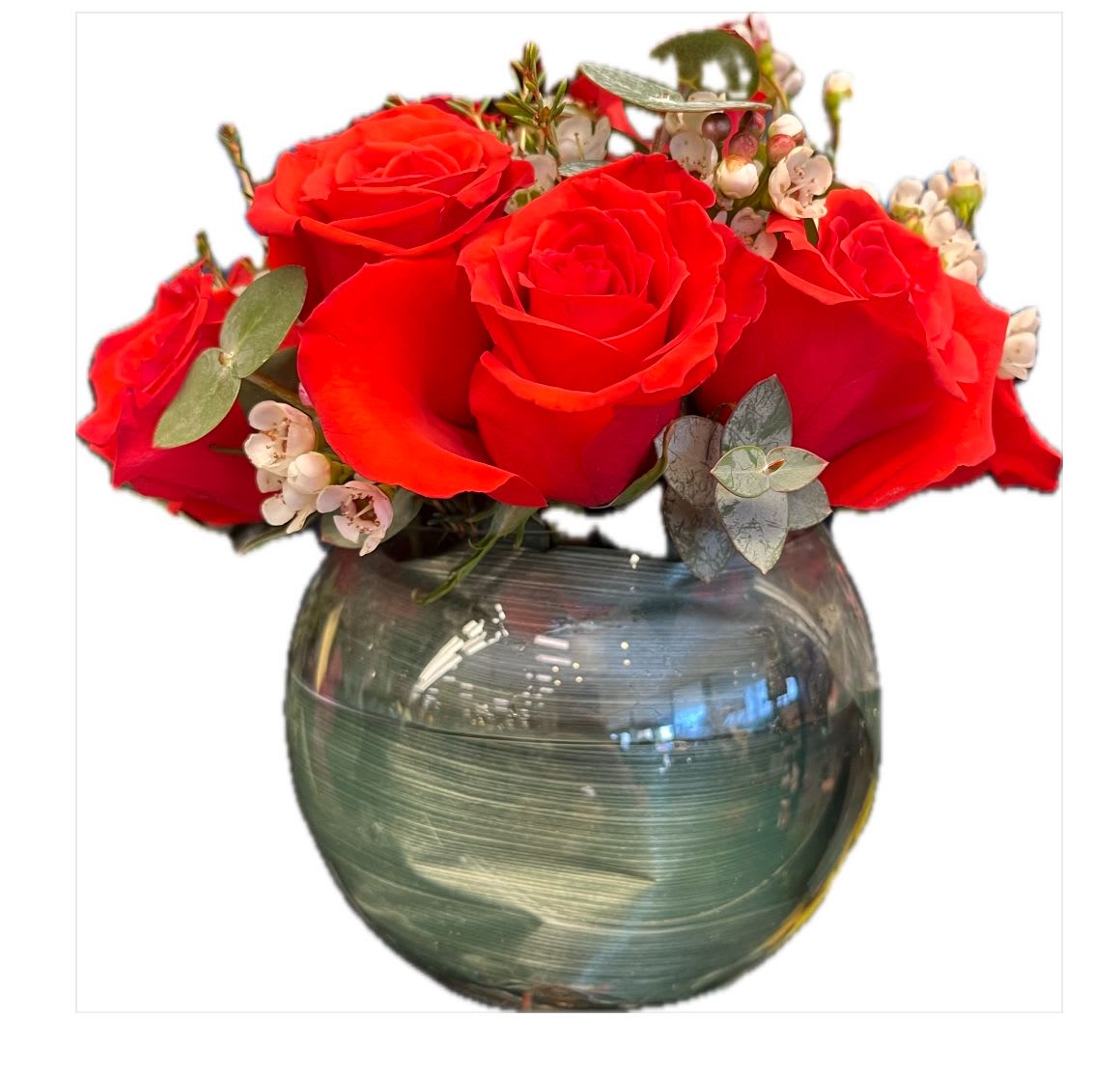 happy orange happy orange - 6 bright orange roses with eucalyptus and wax flower, in a short small fishbowl.