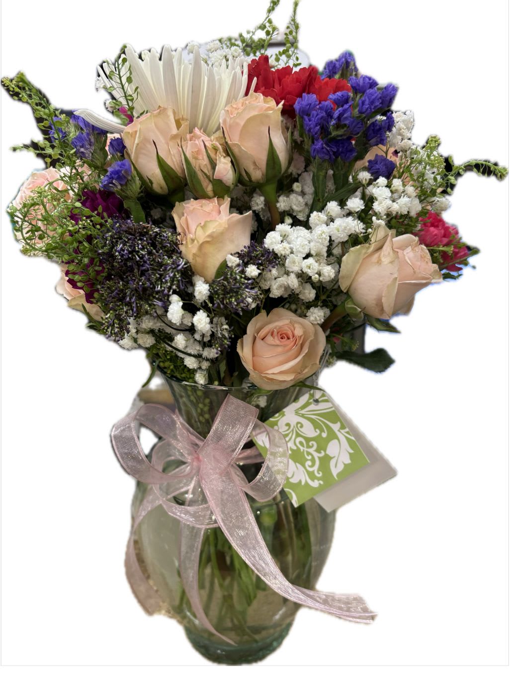soft breeze - light pink mini rose, white disbud and dark pink carnationsand purple statice, along with greenery and baby’s breath.