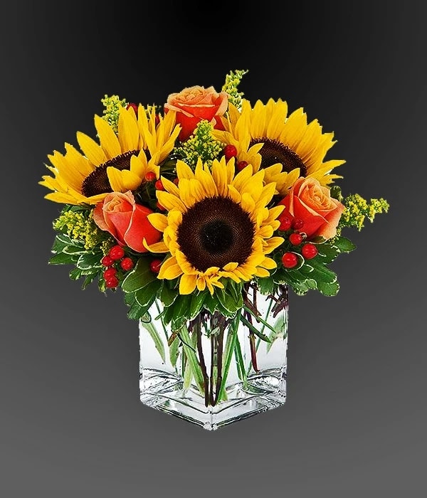 Sunny Day Bouquet - A gift that keeps on giving! First, your lucky recipient will enjoy the bright sunflower bouquet. This reusable gift in yellow is a sunny selection for men and women alike!