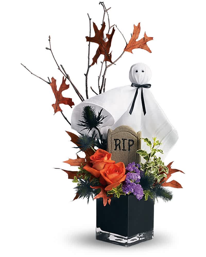 Teleflora's Ghostly Gardens Teleflora's Ghostly Gardens - What fun! A fabulous ghost boo-quet. Perfect for friends, family and colleagues because everybody loves a friendly ghost, especially when he's surrounded by fresh flowers. Orange roses, blue eryngium, purple statice, a birch branch, oak leaves and more are presented in a black cube vase with a googly-eyed ghost. Just scream and we'll send it today!