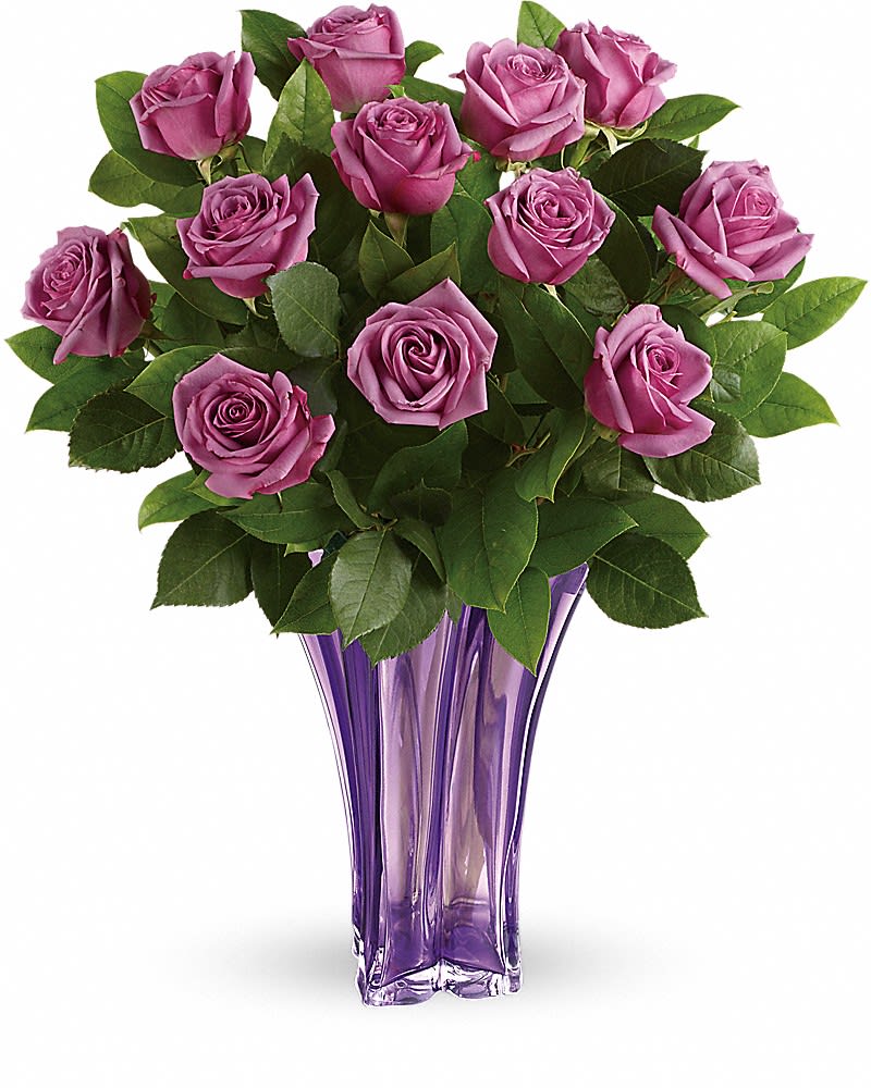 Teleflora's Lavender Splendor Bouquet Teleflora's Lavender Splendor Bouquet - All you need is love - and roses! This simple yet stunning bouquet of luxe lavender long stemmed roses is hand-delivered in a blown glass vase for a truly impressive statement! Lush lavender roses are accented with fresh lemon leaf. Delivered in a Luxurious Lavender vase.