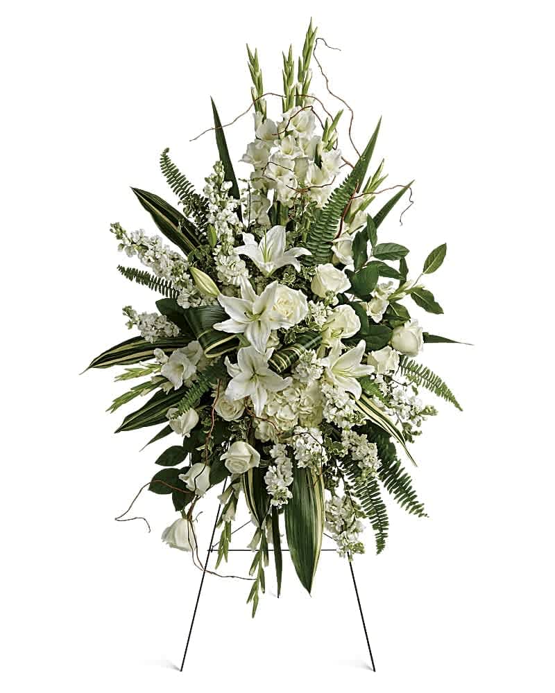 Heartfelt Sympathy Spray Heartfelt Sympathy Spray - This beautiful spray includes white hydrangea, white roses, white oriental lilies, white gladioli, white stock, pitta negra, sword fern, curly willow, variegated aspidistra leaves, and lemon leaf. Delivered on a wire easel. This beautiful spray includes white hydrangea, white roses, white oriental lilies, white gladioli, white stock, pitta negra, sword fern, curly willow, variegated aspidistra leaves, and lemon leaf. Delivered on a wire easel.