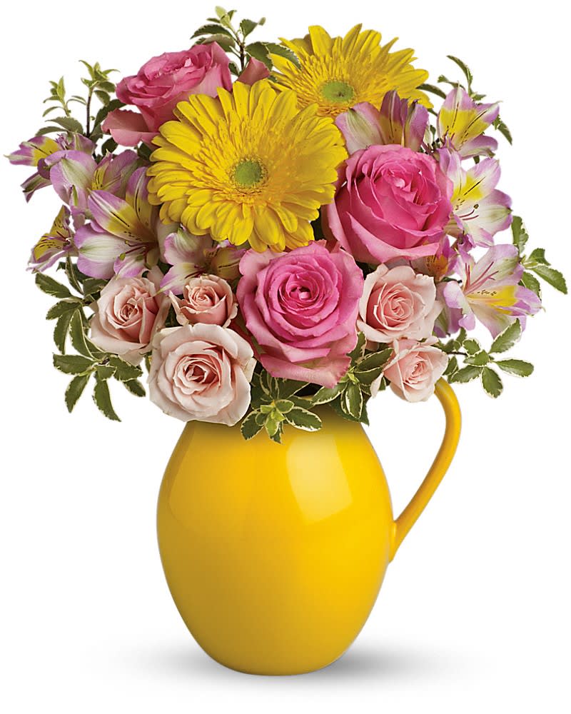 Teleflora's Sunny Day Pitcher Of Charm Teleflora's Sunny Day Pitcher Of Charm - Fill their cup with happiness! This signature Sunny Day pitcher is sure to pour joy! Filled with beautifully bright gerberas and sweet roses, it's a gift they'll always treasure. Includes pink roses, yellow gerbera daisies and alstroemeria. Delivered in a Sunny Day pitcher.