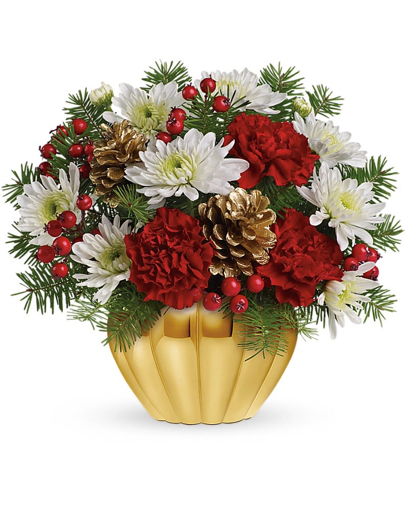 Precious Traditions Bouquet by Teleflora Precious Traditions Bouquet by Teleflora - This lovely winter bouquet features red carnations and white cushion spray chrysanthemums arranged in our festive gold scalloped design bowl. Red carnations and white cushion spray chrysanthemums are accented by douglas fir and red berry spray. Delivered in Teleflora's gold scalloped design bowl.