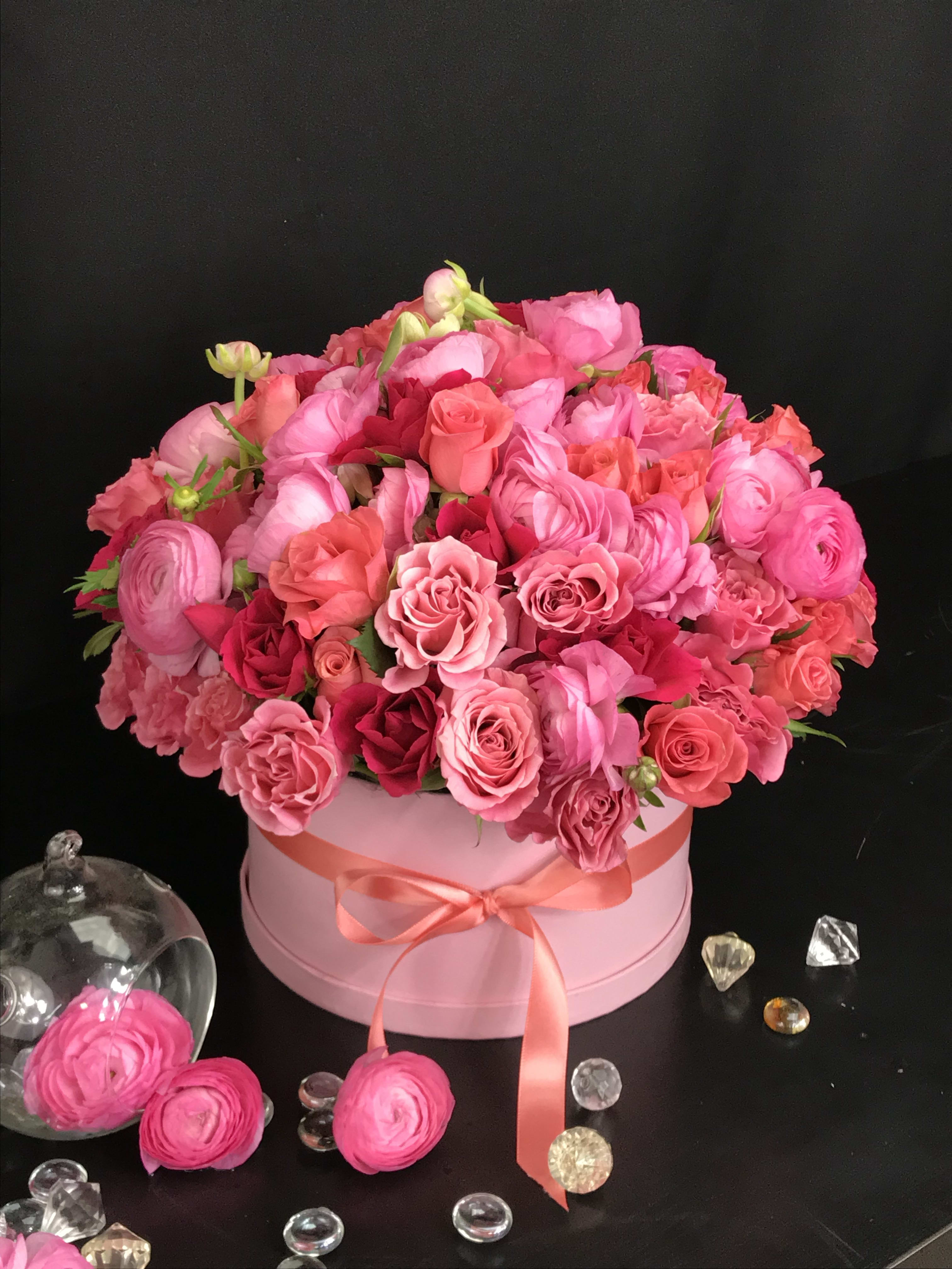 Bright mix roses and ranunculus - Flower arrangement in a medium box with assorted color roses, spray roses and ranunculus  