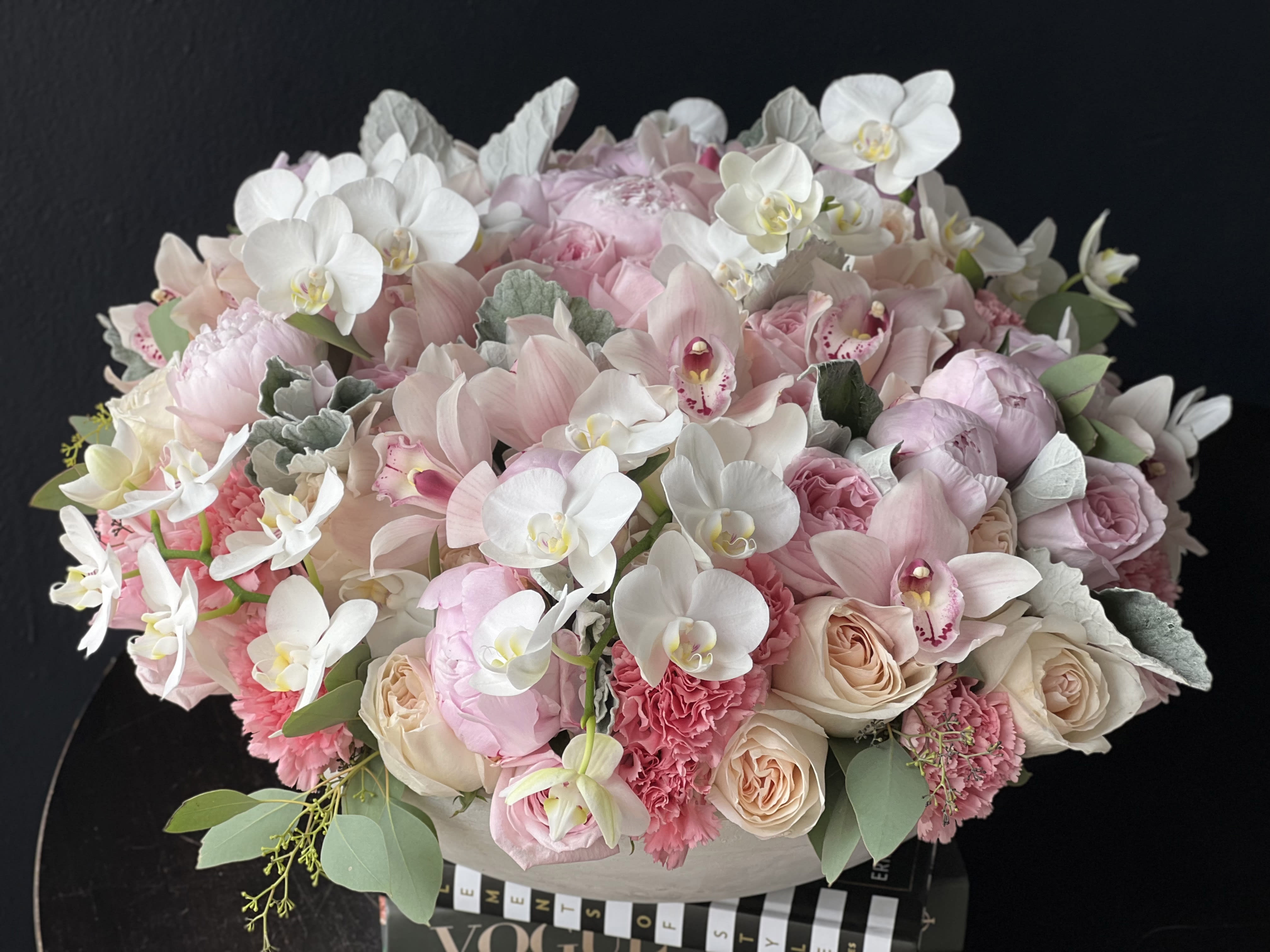 Always and forever  - Large cement vase with mixed flowers. Large, lavish arrangement with roses, garden roses, phalaenopsis orchids, peonies, cymbidium orchids, carnations and greenery Perfect for any occasion or space
