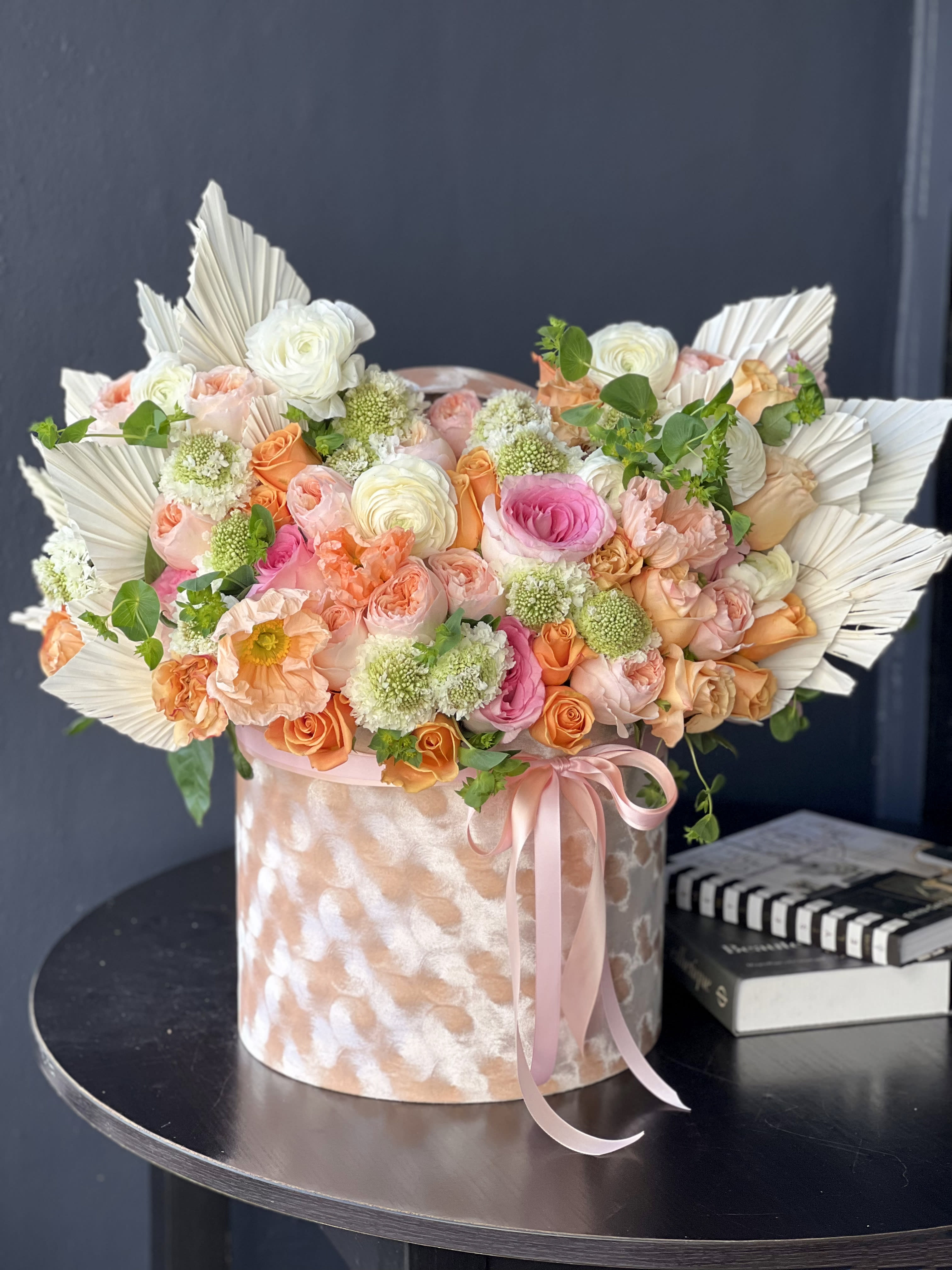 THE SONG OF SPRING  - Luxurious arrangement full with flowers.  Includes roses, garden roses, ranunculus seasonal flowers and dry leaves.