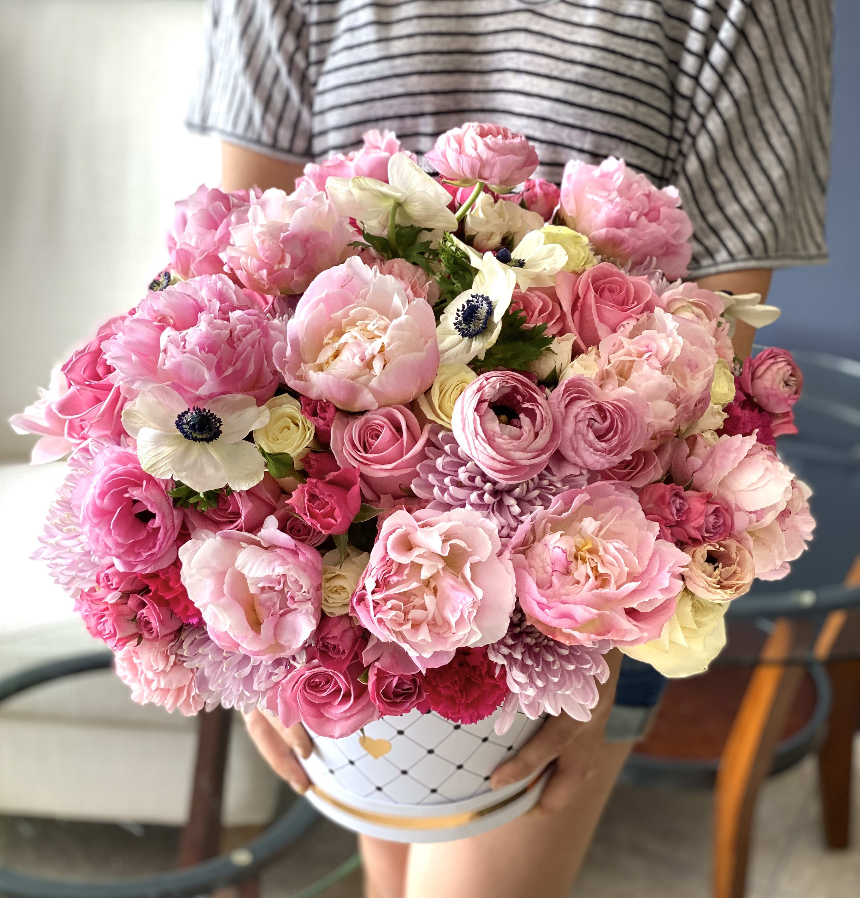 Flower Design in Box with Spring Flowers  - Flower Design in Box with Spring Flowers. Roses, spray roses, ranunculus, anemones, peonies, and mixed flowers. 