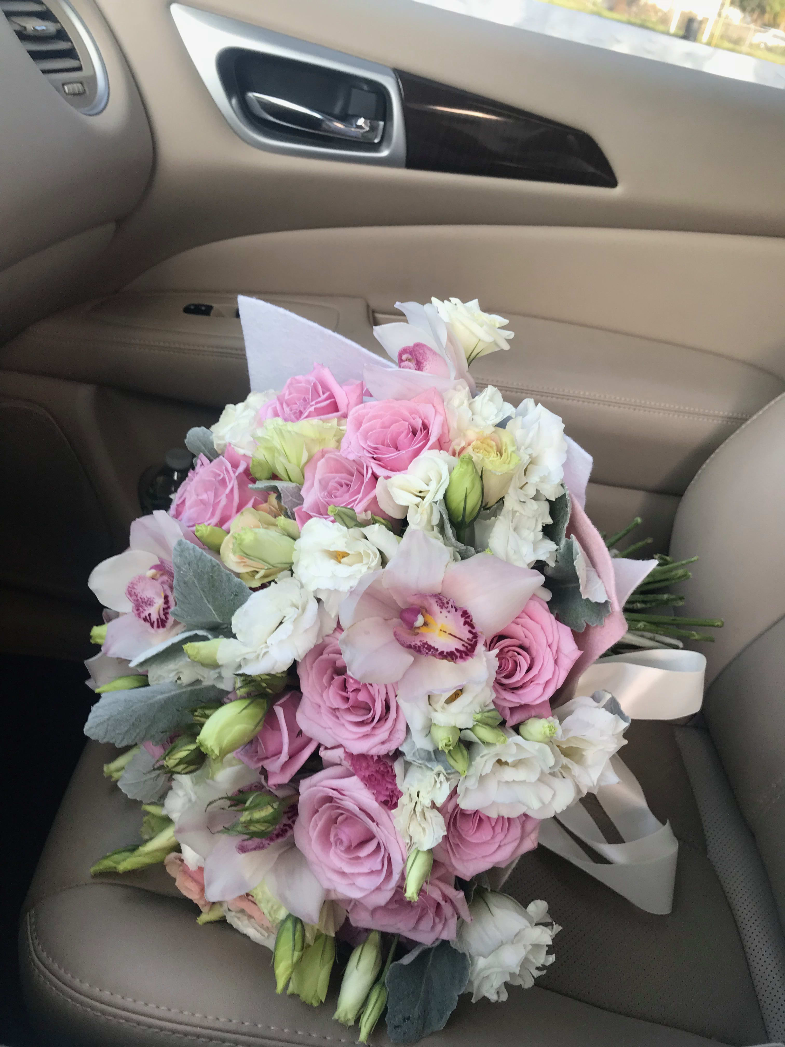 Delicate Bouquet with mix flowers  - Modern flower arrangement in light colors with roses, orchids and mix seasonal flowers 