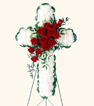 Eternal Cross Eternal Cross - White carnations and red roses are designed into this religious floral display. Appropriate to send to the funeral home. Arrangement is delivered on an easel for display.