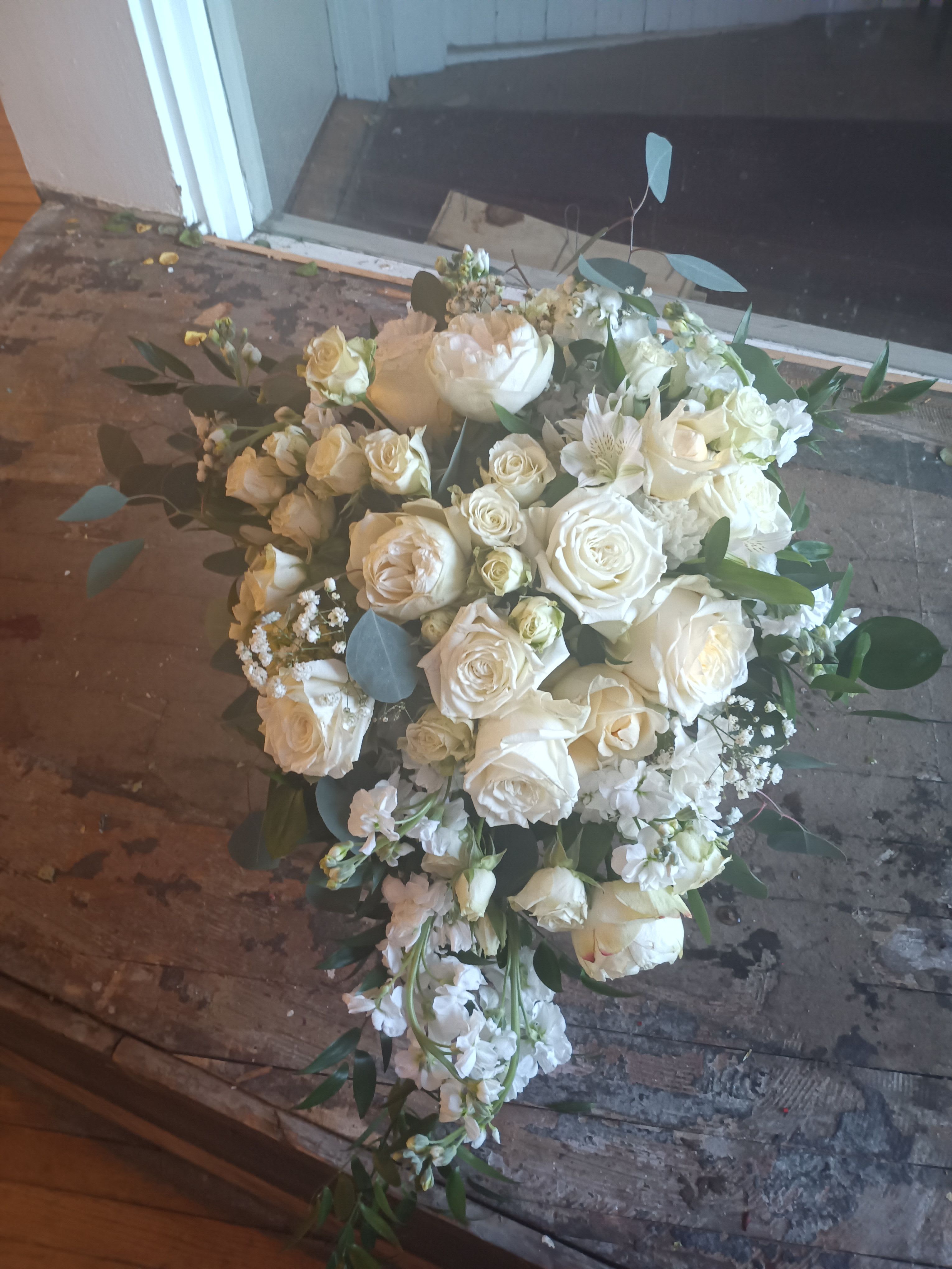 Marissa's bridal cascade - Beautiful vintage white traditional cascade with standard, garden and spray roses, stack, green hydrangea, eucalyptus and alstromeria