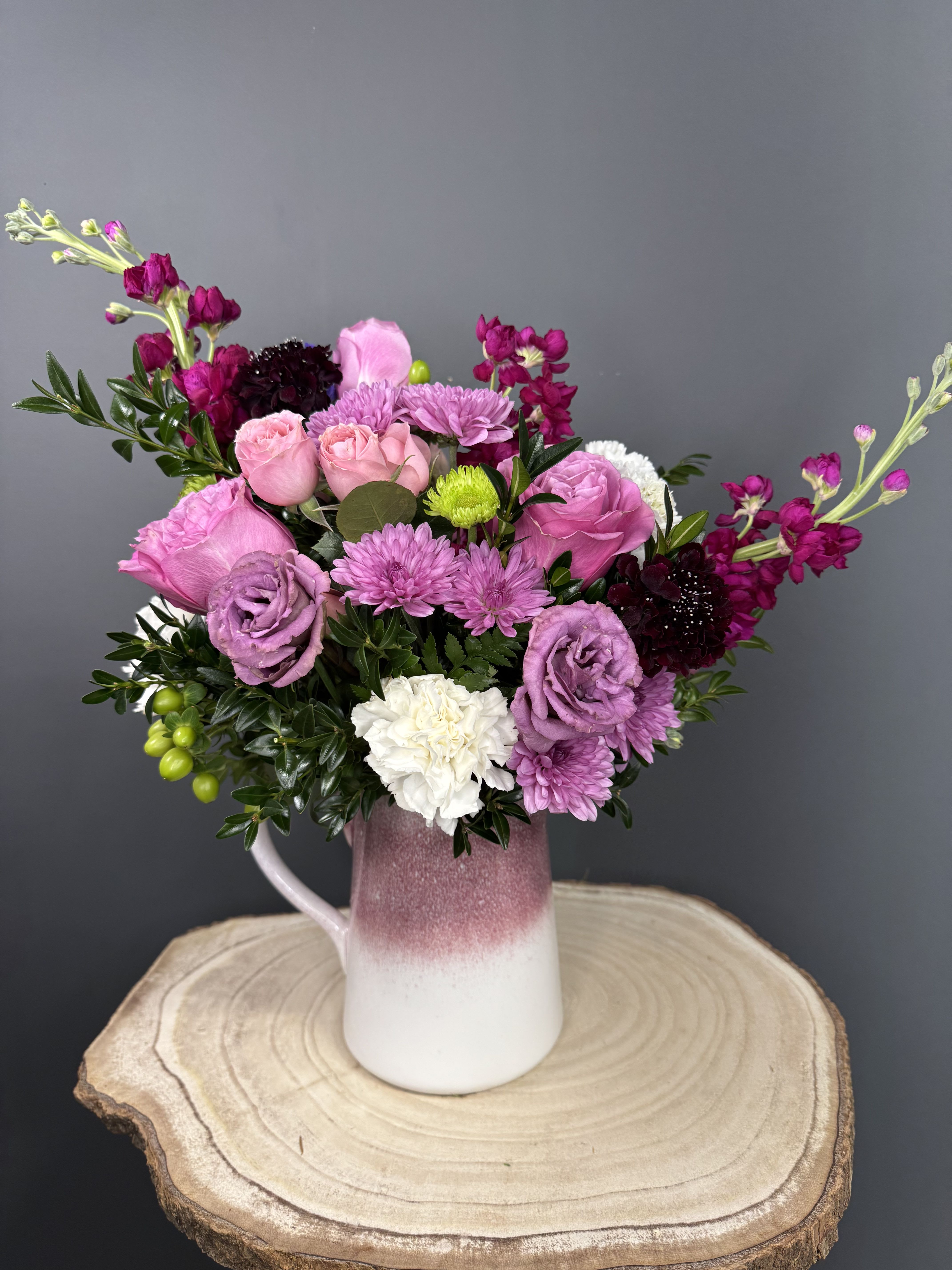 Artisanal Lavender  - Sure to make her blush, this is as sweet as they come! Nothing's prettier than a delicate bouquet of pink and lavender roses, presented to perfection in this artisanal ceramic pitcher with gorgeous, iridescent reactive glaze.