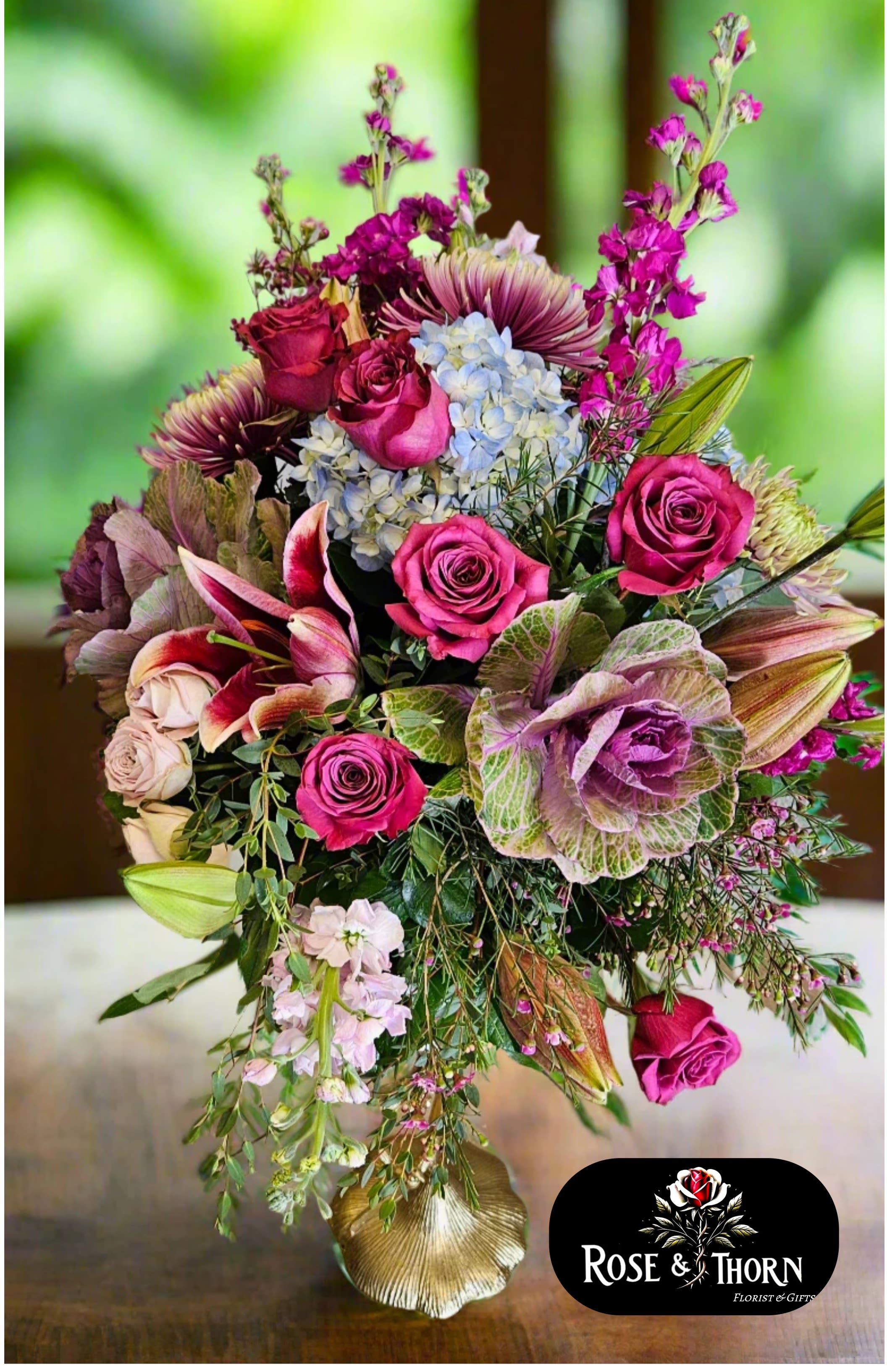 Luxury Love IN. 114 - Luxury Love is a soft and extravagant arrangement that will surely make the recipient gasp. With   Purple roses, this arrangement is pure class and elegance and will surely wow.  Approximate Dimensions: 18&quot;D x 22&quot;H