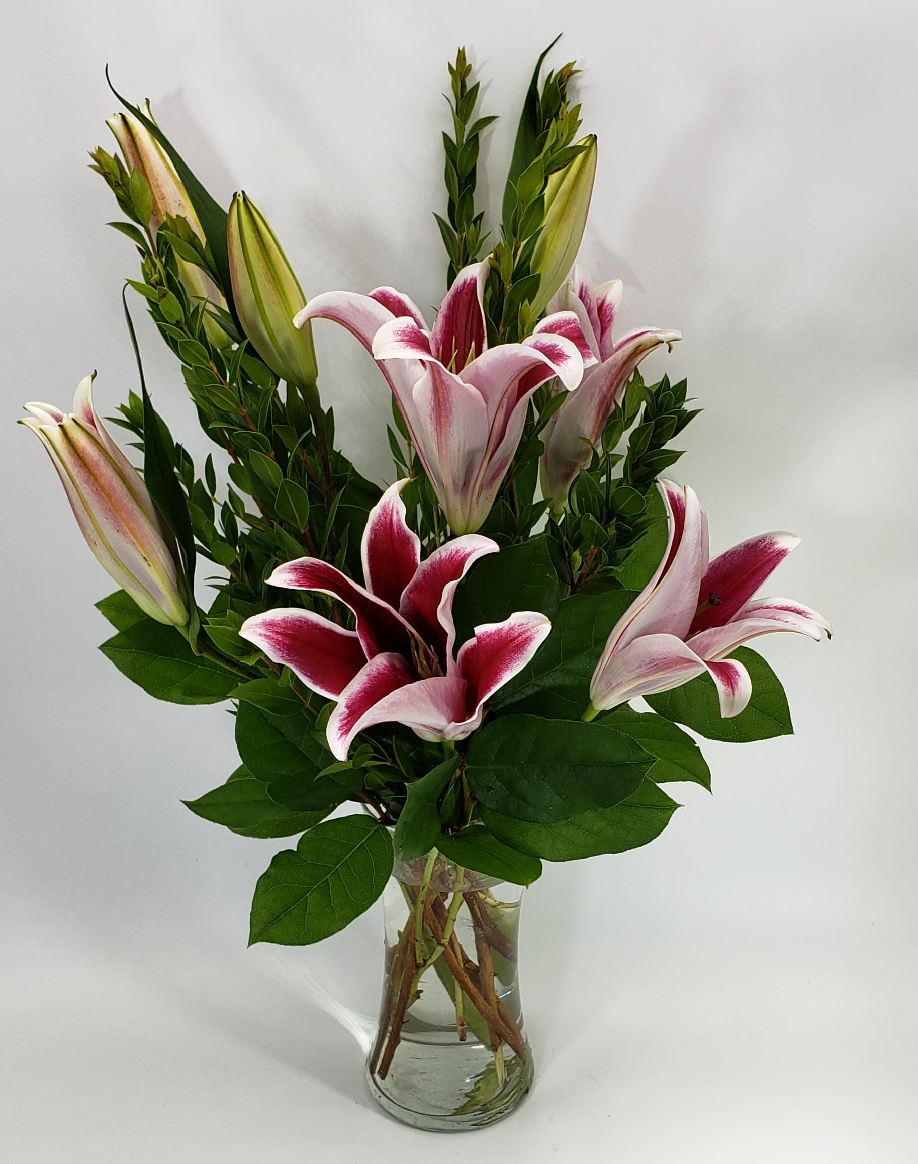 Stargazer Bouquet Stargazer Bouquet - Stargazer lily bouquet is very long lasting and fragrant. Approximately 20 inches tall and contains lilies at all stages of opening.