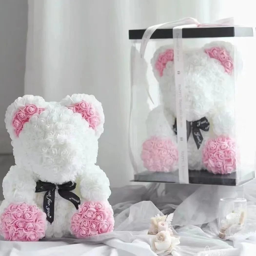 White Bear White Bear - Meet our adorable White Rose Bear, a cuddly companion infused with the sweetness of artificial white flowers! This little charmer is here to steal hearts with its irresistible red rose ensemble, making it the perfect gift for spreading joy and love.