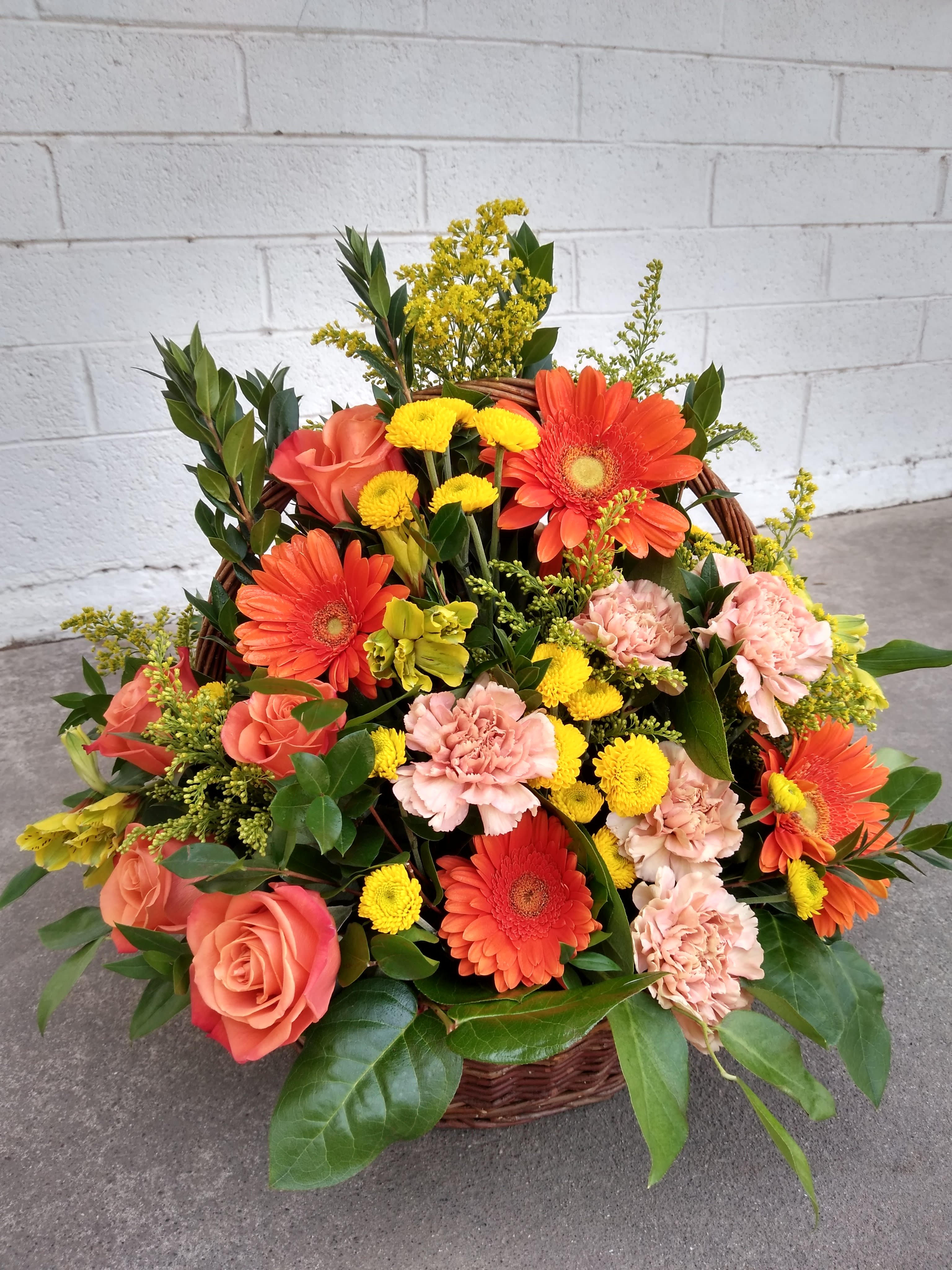 SUNSHINE SURPRISE BY BLOOMING CANYON - Orange and yellow mixed flowers in basket