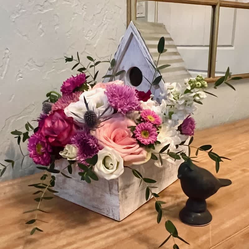 Diane's Blooming Birdhouse - Diane's Blooming Birdhouse is a cute petite arrangement of assorted flowers in a collectible wooden birdhouse. This arrangement is a Mother's Day exclusive. Limited quantities, so order while supplies last. 