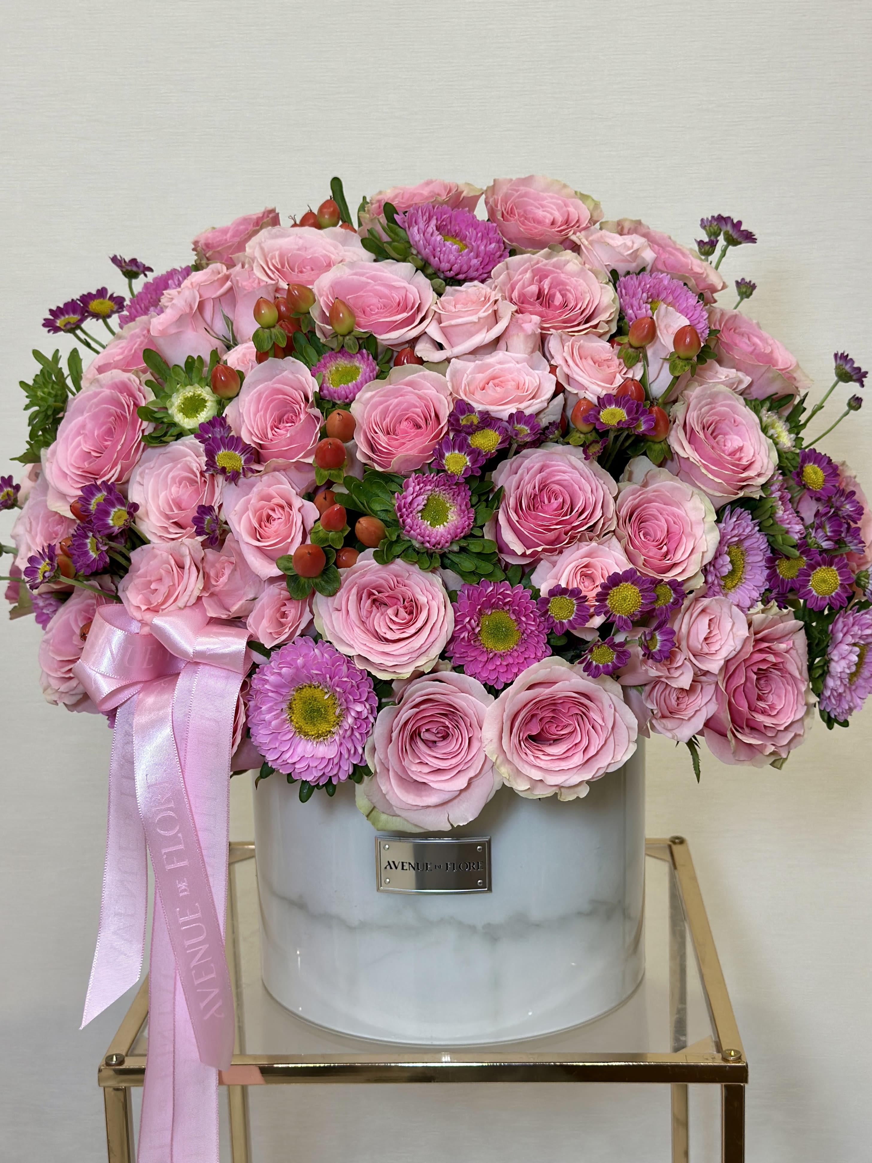 Marble Grace - Elevate your gift-giving with our exclusive luxury Marble Boxes featuring beautiful pink flowers that add a soft, romantic touch to any occasion. Designed to impress, the elegant box is a sophisticated alternative to traditional paper box and is perfect for repurposing to store jewelry, makeup, or cherished memories—a gift that continues to delight long after the flowers have been received. 