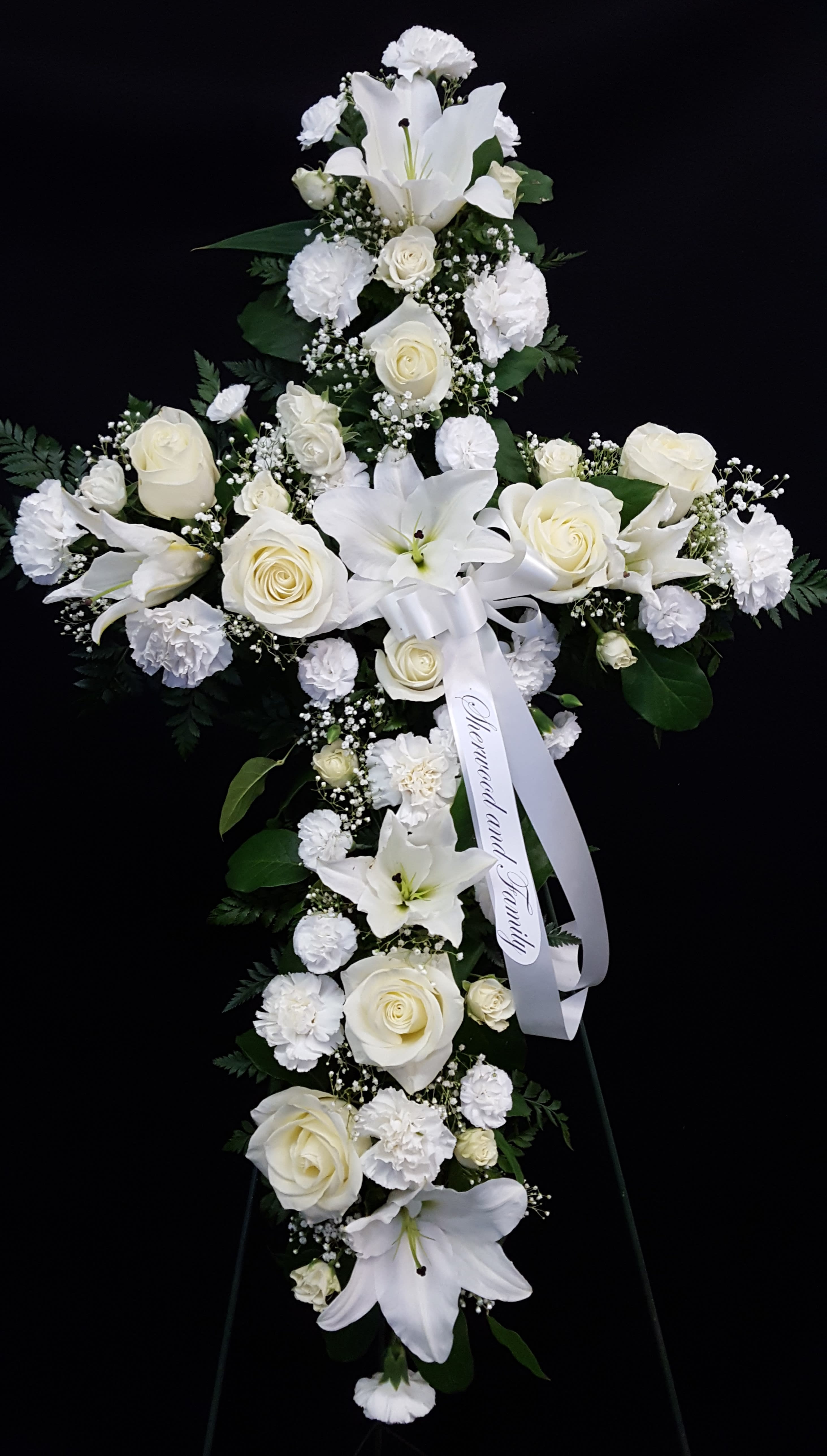 Serenity Cross Serenity Cross - 30 inch standing cross featuring a variety of white flowers. Ribbon optional