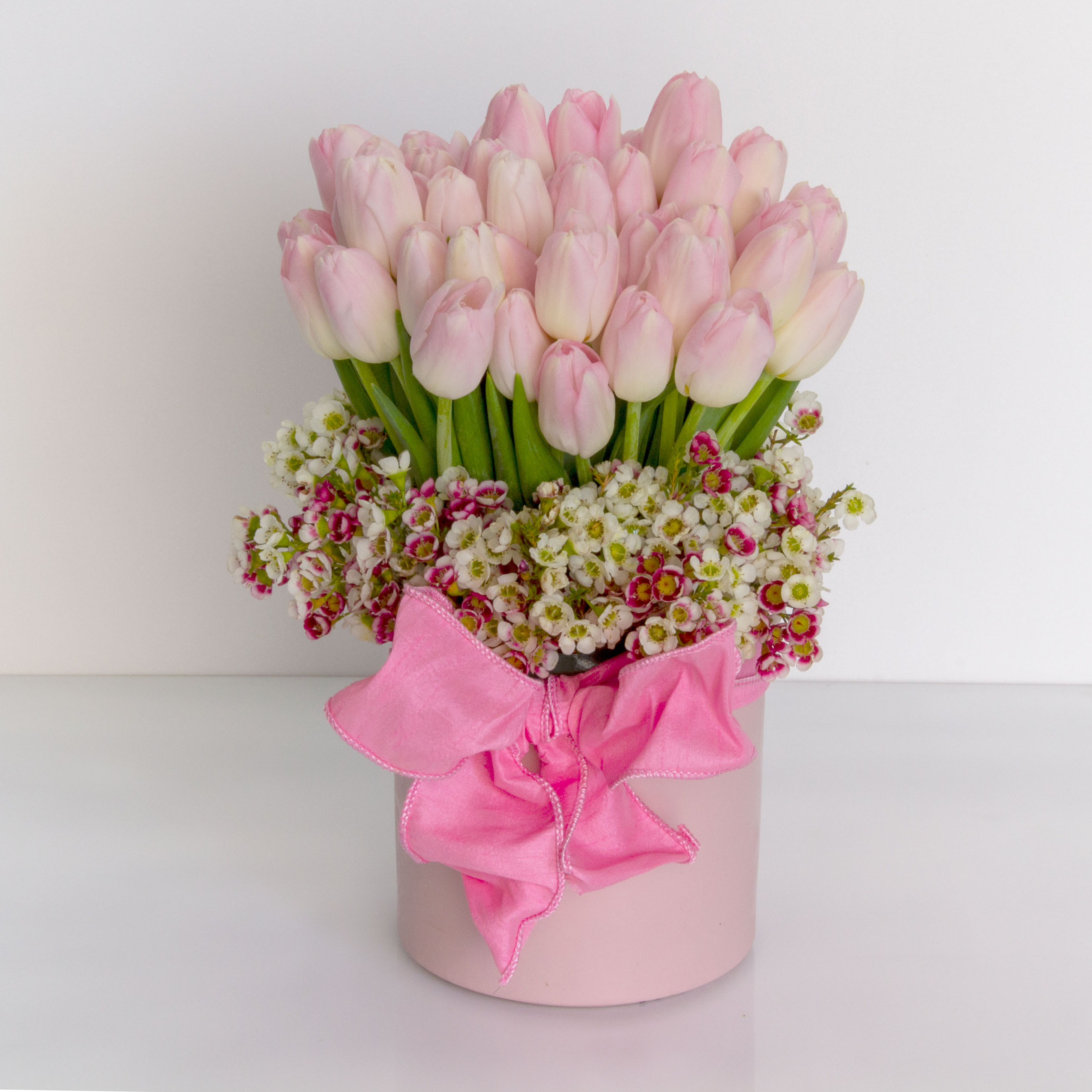 Cotton Candy - Pasadena Florist  - 50. Blush Tulips in a ceramic vase   Approx. 10-12&quot; Tall   Standard - 50  Deluxe- 100  