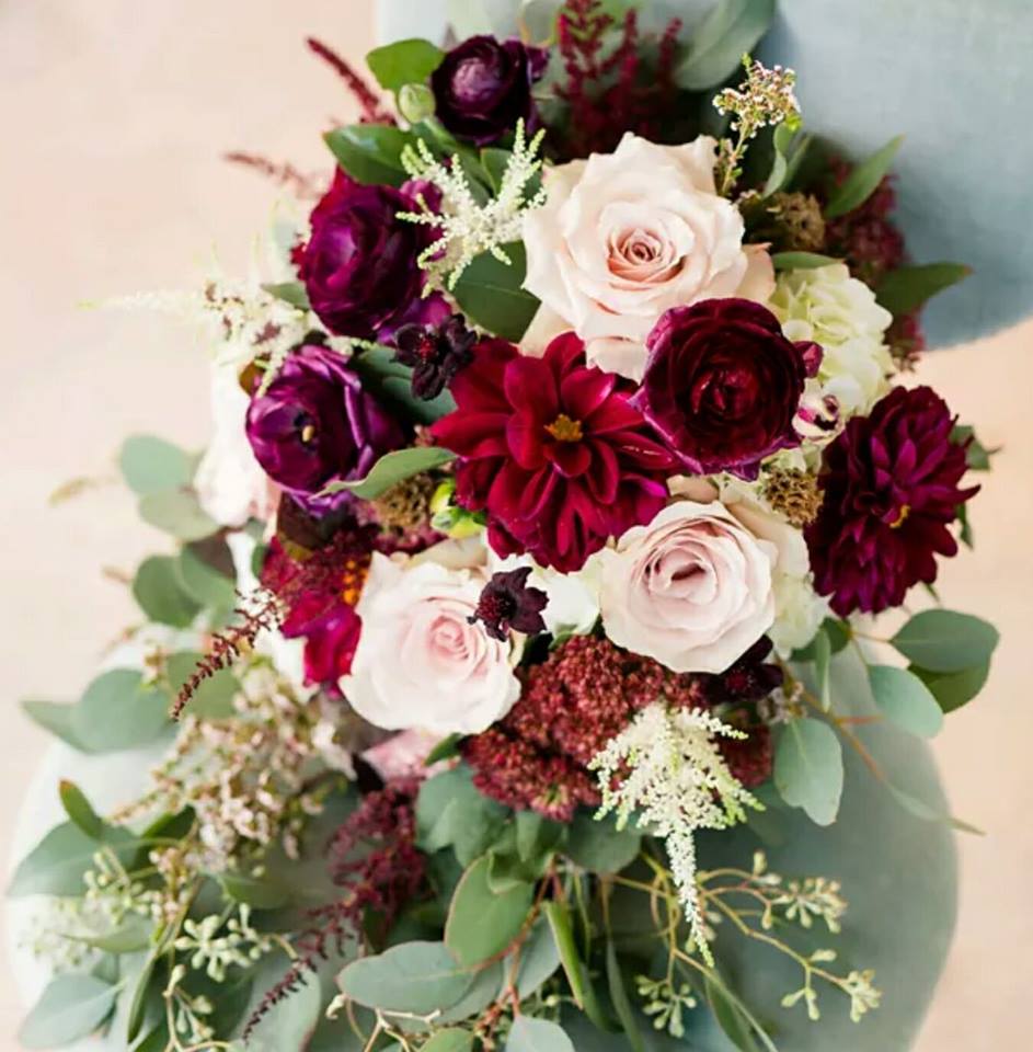 Burgundy and Blush Bridal Bouquet  Burgundy and Blush Bridal Bouquet  - Weddings are our thing y'all!  And southern style weddings are our favorites!  We love hydrangea, garden roses, magnolia, peonies and eucalyptus!  We can design your entire event around this beautiful bouquet!  Email or call us to get started.