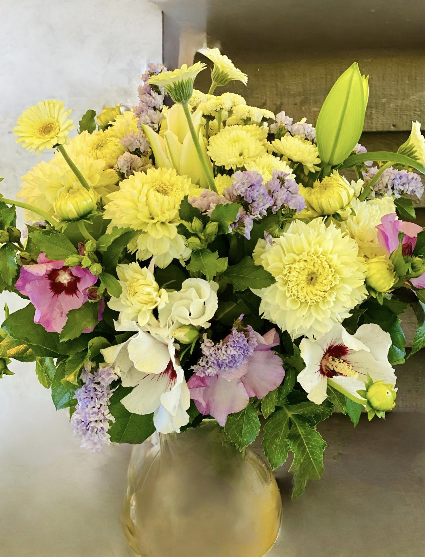 Calm Your Heart - An artistic and soft arrangement is a pleaser and interesting as it is impressive. Lavender, soft pink and White is an architectural design give this arrangement its unique appeal.   APPROXIMATE DIMENSIONS       12&quot;W X 18&quot;H Standard                                                            14&quot;W X 22&quot;H Deluxe                                                           16&quot;W X 25&quot;H   Premium  